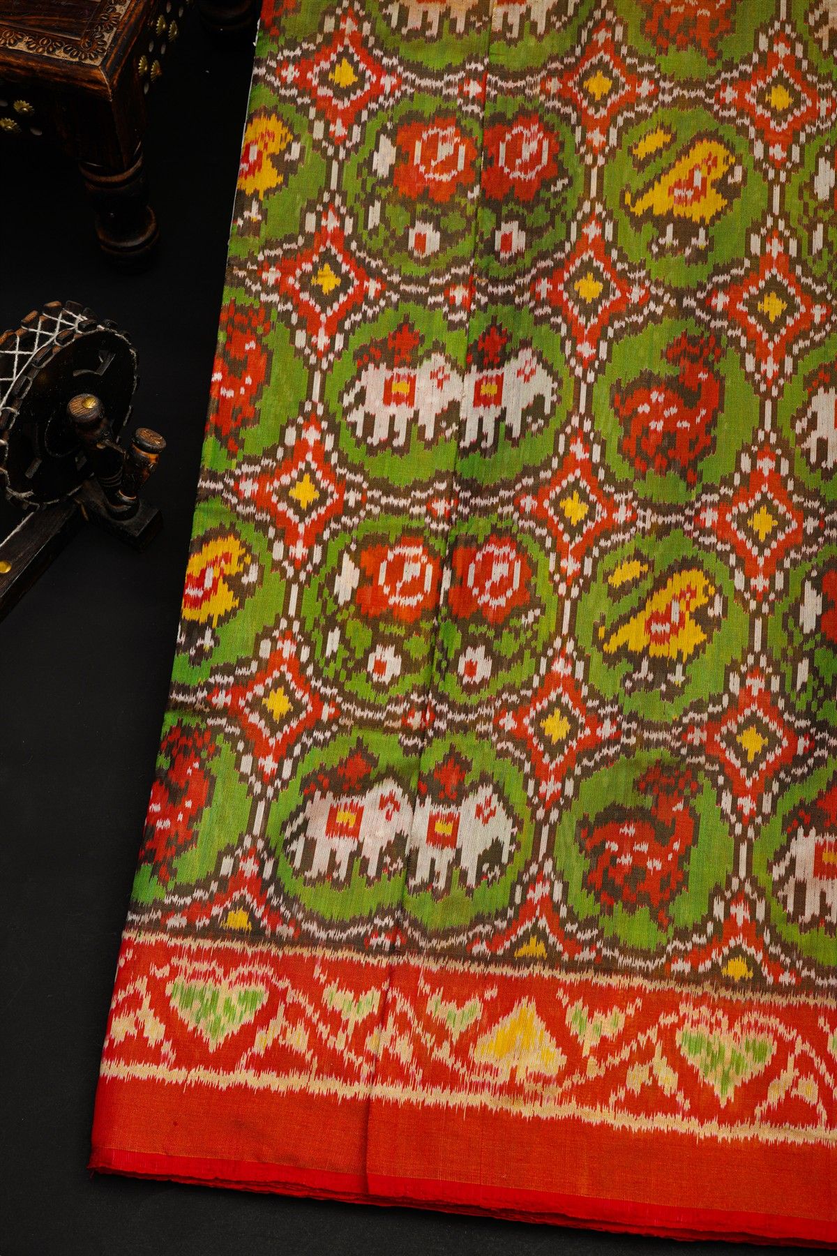 Patola Silk Mehendi Green Saree With Florals And Animals Body