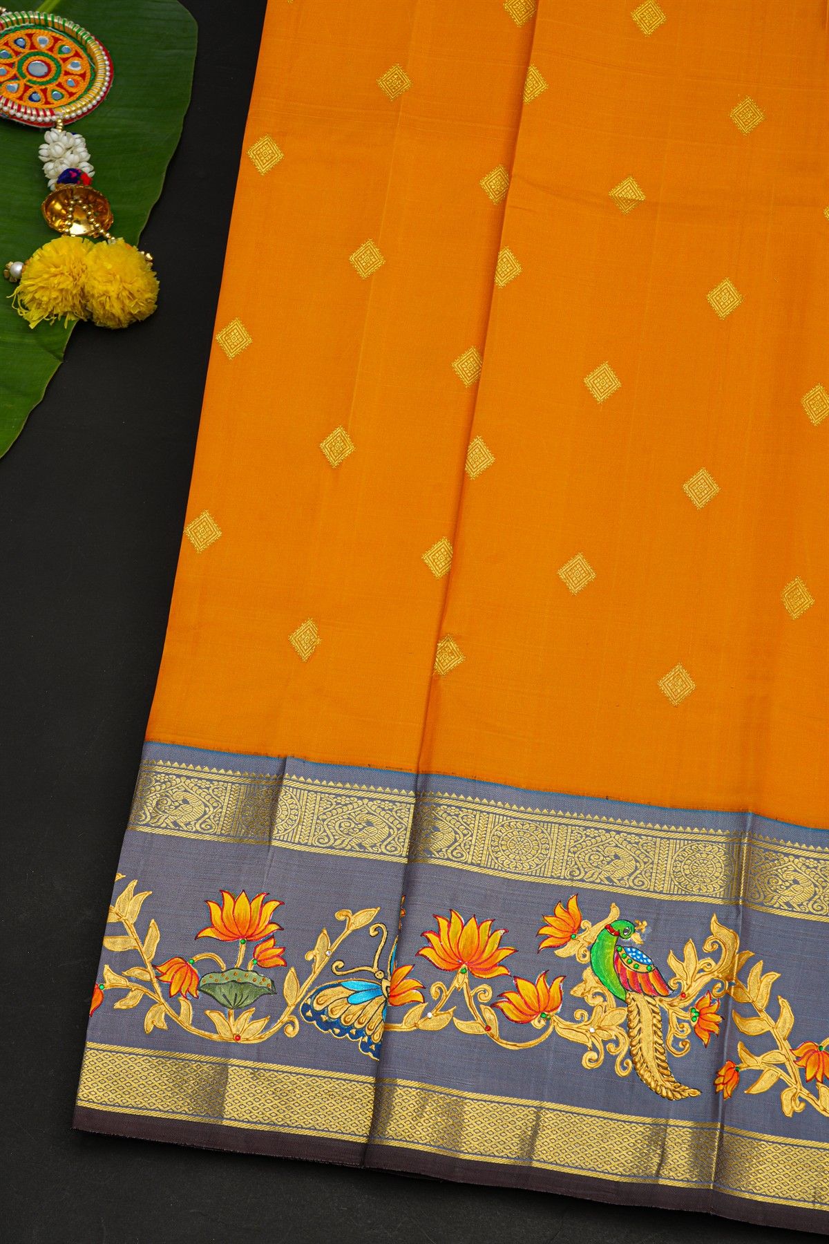 Gadwal Silk Orange Saree With Tanjore Hand Painted Florals And Peacocks Border