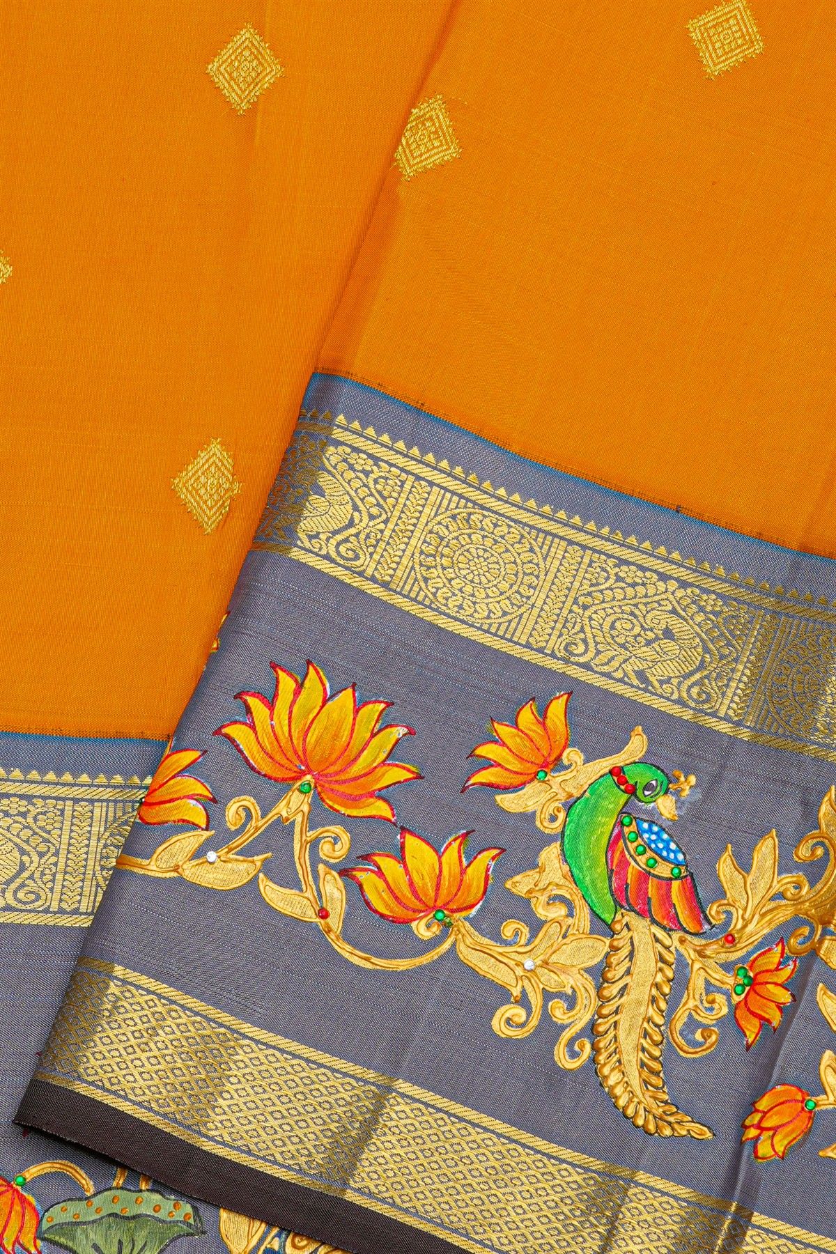 Gadwal Silk Orange Saree With Tanjore Hand Painted Florals And Peacocks Border