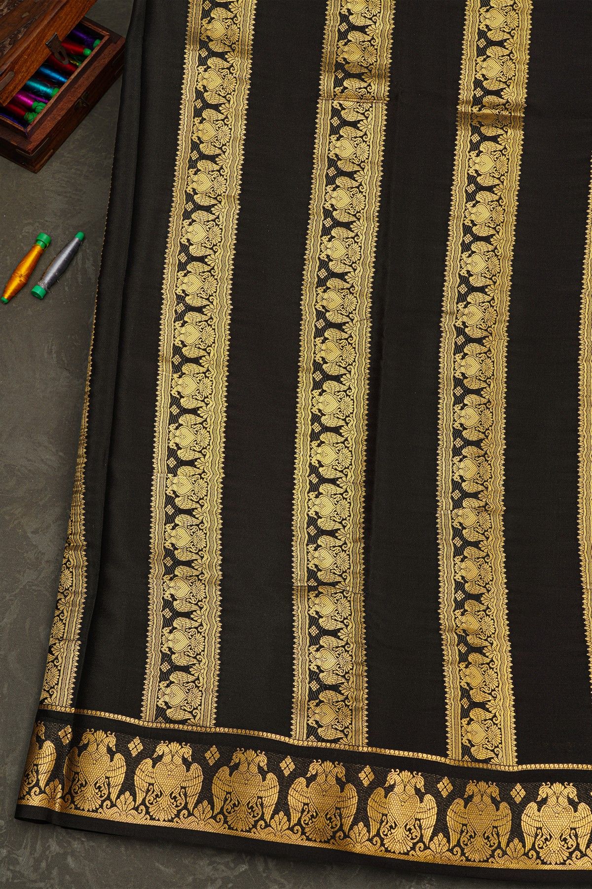 Mysore Crepe Maroon Saree With Floral Gandaberunda Buttis Border