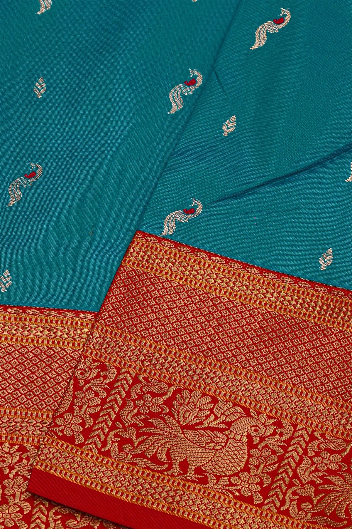 Narayanpet Silk Teal Blue Saree With Peacock And Leaves Buttis Body