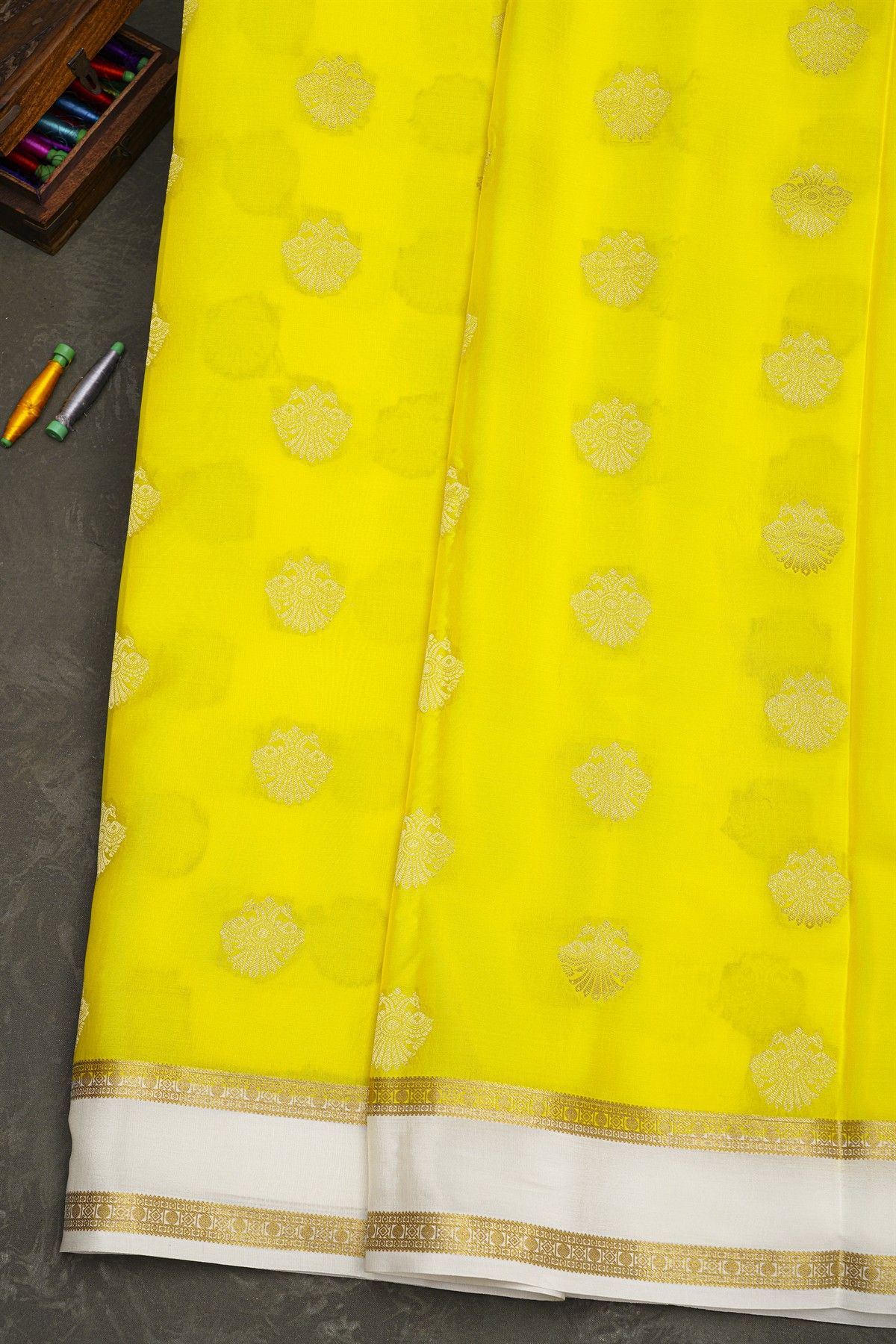 Mysore Crepe Yellow Saree With Gandaberunda Buttis Body