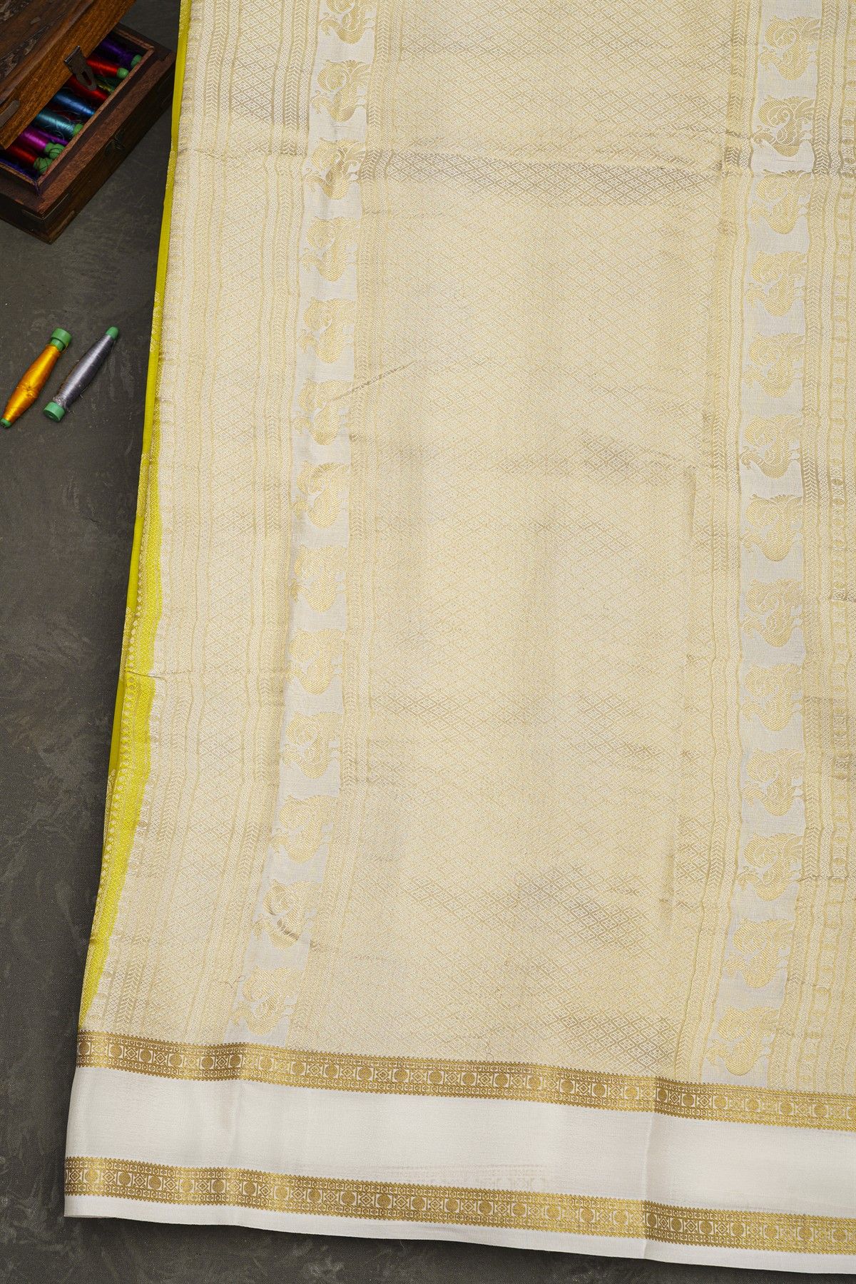 Mysore Crepe Yellow Saree With Gandaberunda Buttis Body