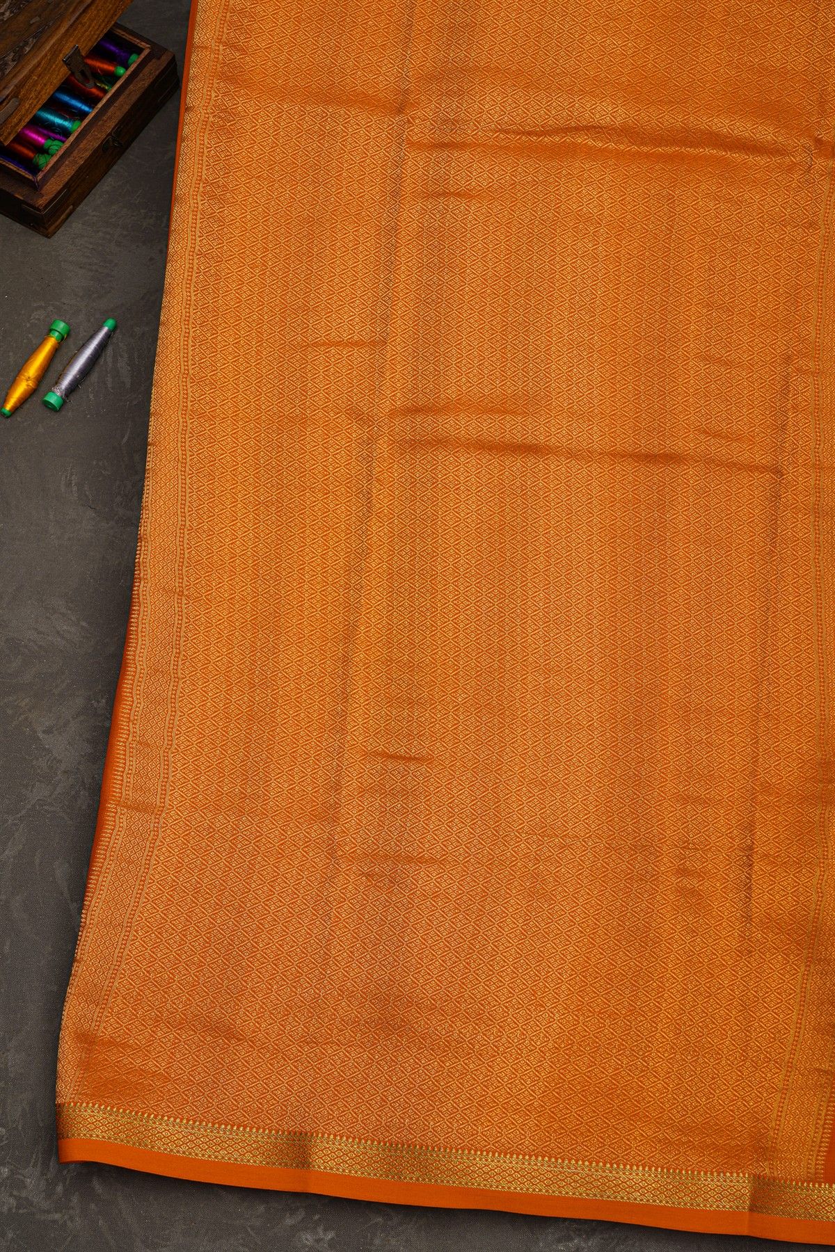 Mysore Crepe Rust Orange Saree With Small Mango Paisley Buttis Body