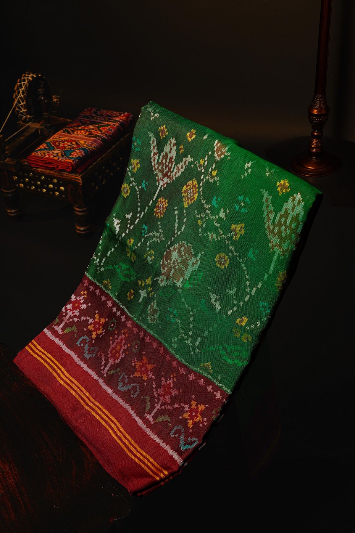 Patola Silk Green Saree With All Over Jaals And Leaf Lines Border
