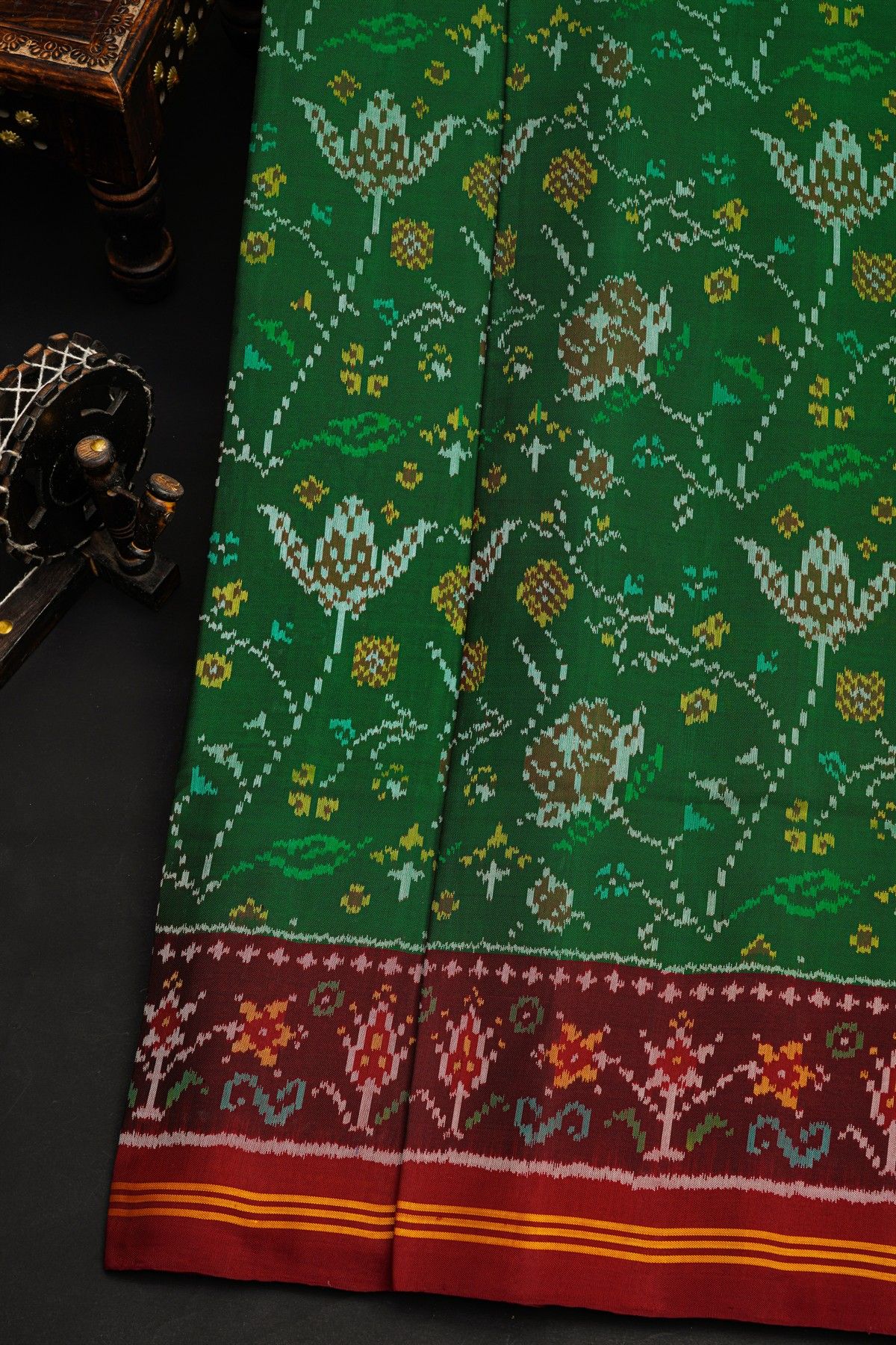 Patola Silk Green Saree With All Over Jaals And Leaf Lines Border