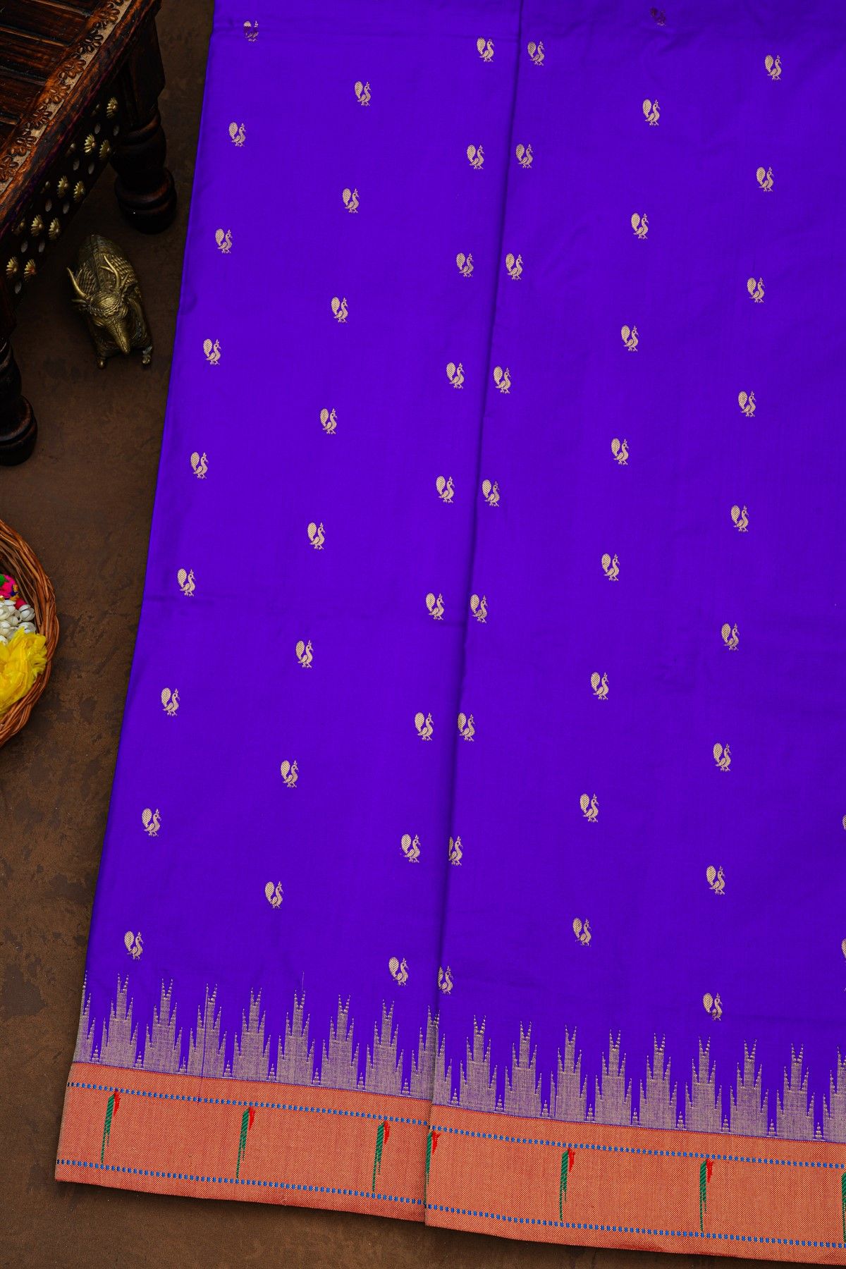 Paithani Silk Blue Saree With All Over Peacock Buttis In Zari Body And Single Muniya Border