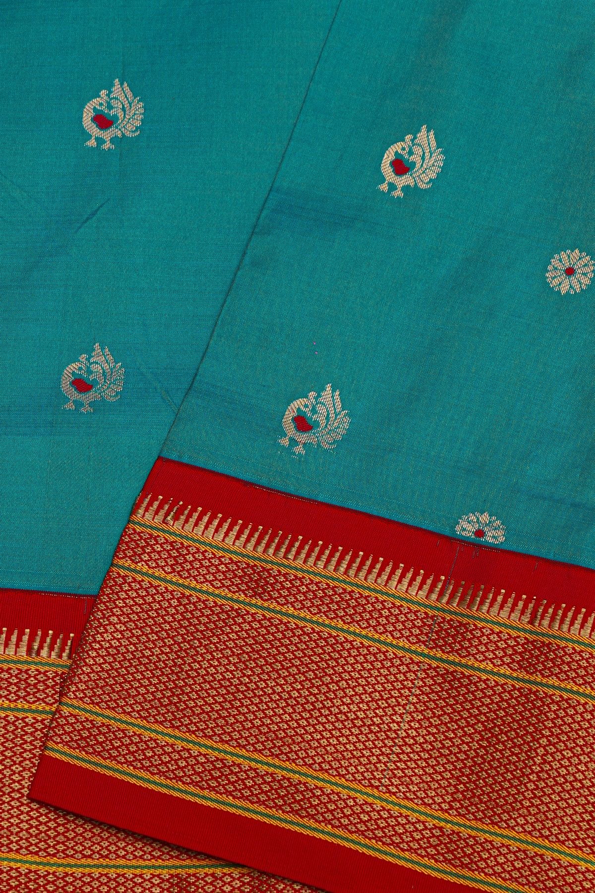 Narayanpet Silk Teal Blue Saree With Florals And Peacocks Buttis Body