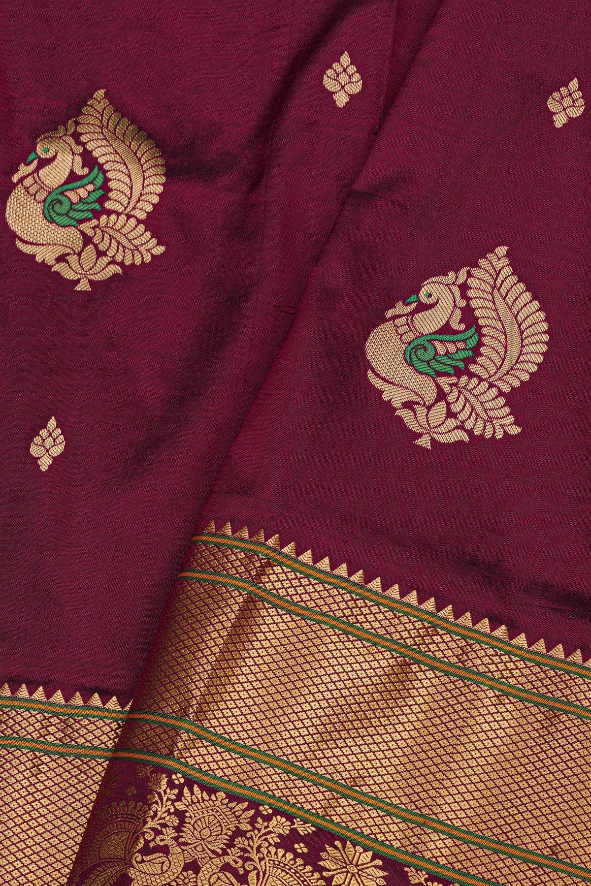 Narayanpet Silk Dark Wine Saree With Florals And Peacock Buttis Body