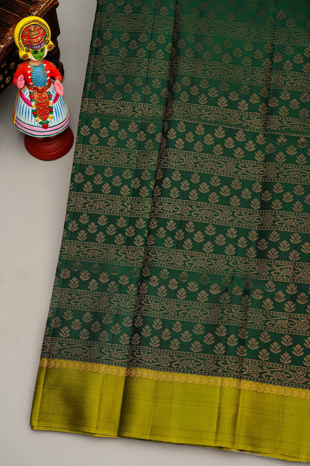 Coimbatore Silk Bottle Green Saree With All Over Florals And Zari Lines
