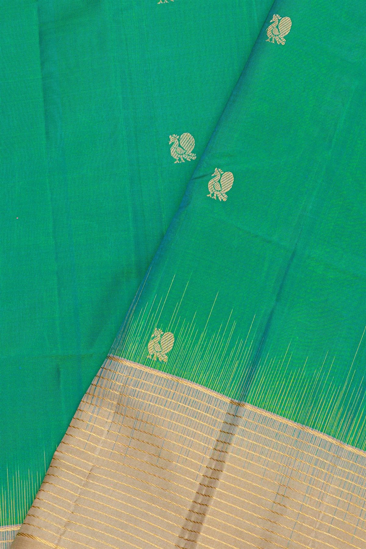 Coimbatore Silk Teal Green Saree With Florals And Peacock Buttis Body