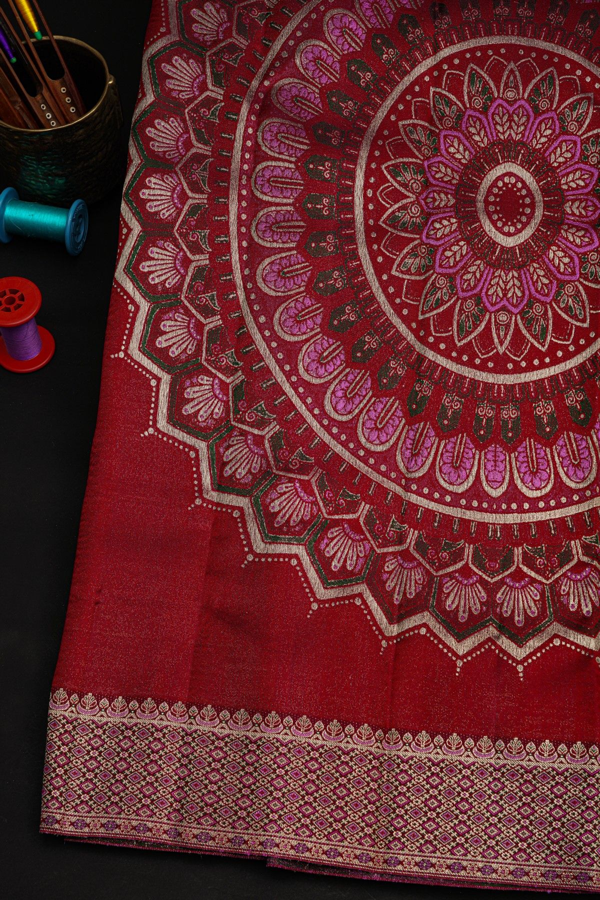 Kancheepuram Tissue Wine Colour All Over Human Motifs Border Embossed Weaving Saree