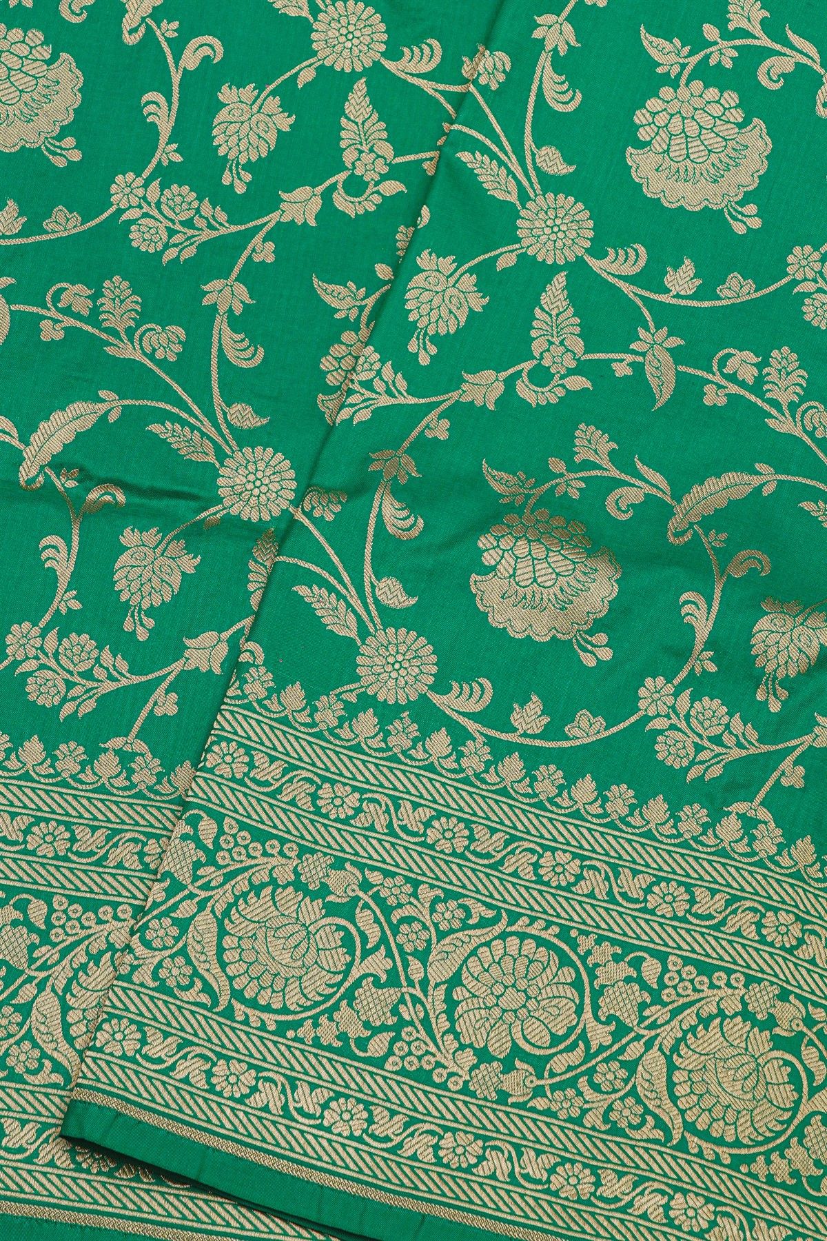 Banarasi Silk Sea Green Saree With Floral And Leaf Jaal Body