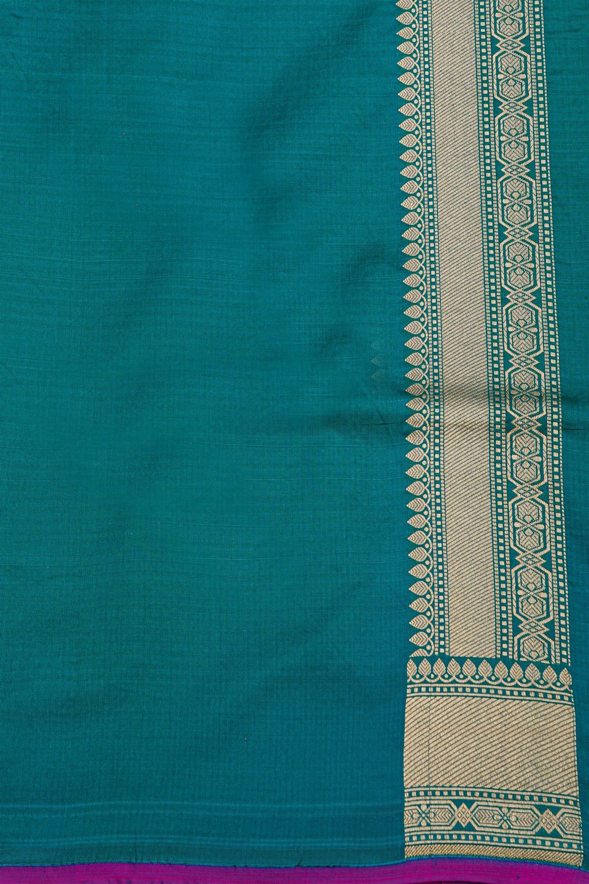 Banarasi Silk Peacock Blue Saree With Cross Lines In Zari Border