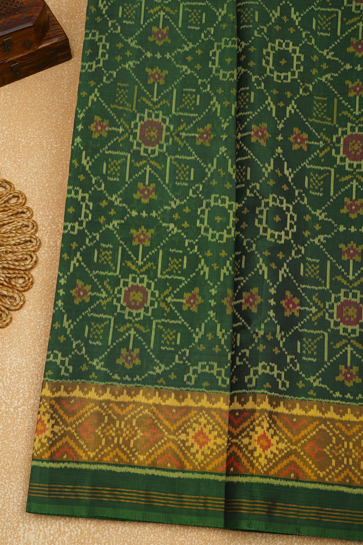 Patola Silk Bottle Green Saree With Florals And Leaves Jaal Border