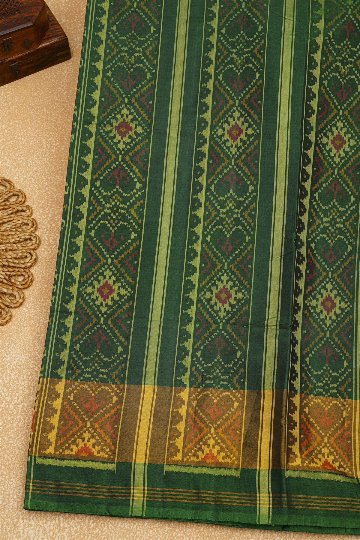 Patola Silk Bottle Green Saree With Florals And Leaves Jaal Border