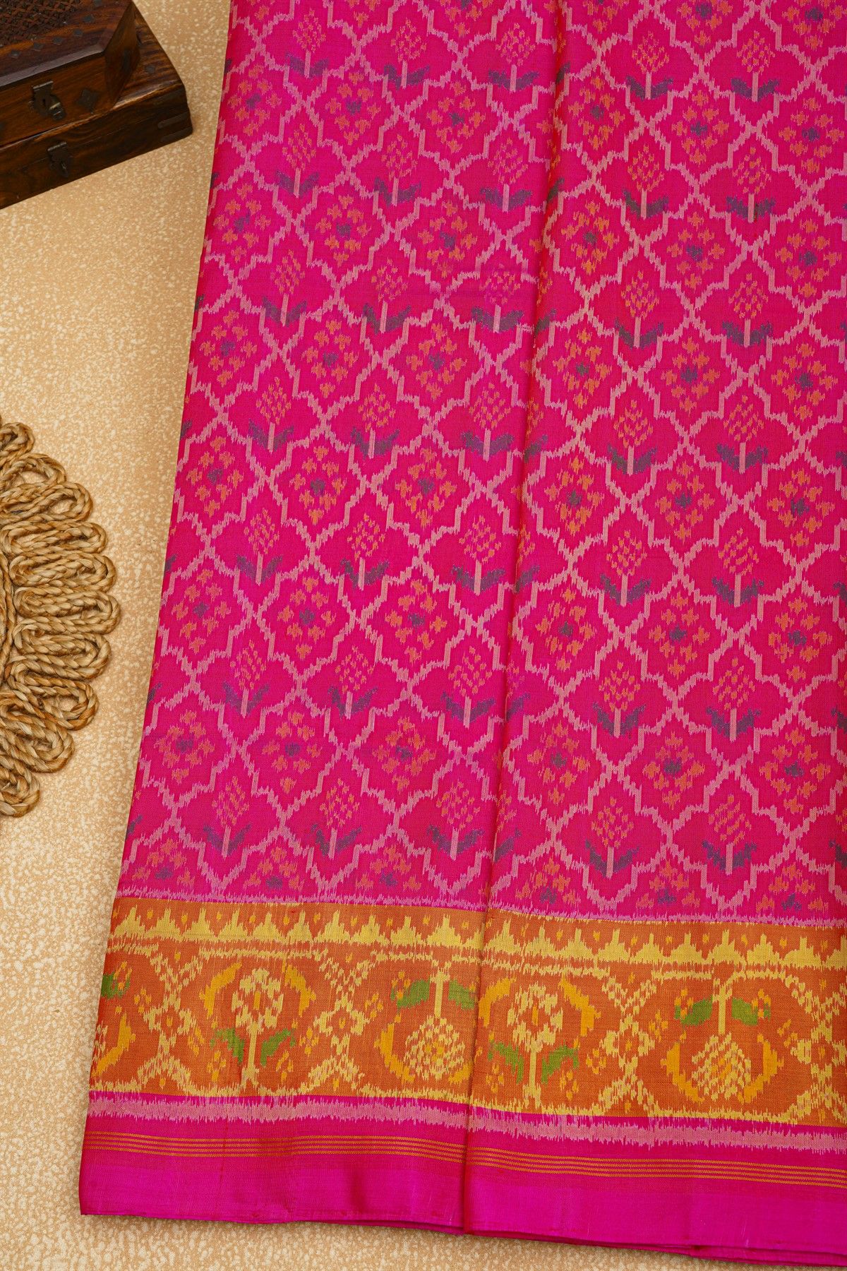 Patola Silk Pink Saree With Floral Buttis In Cross Checks Body