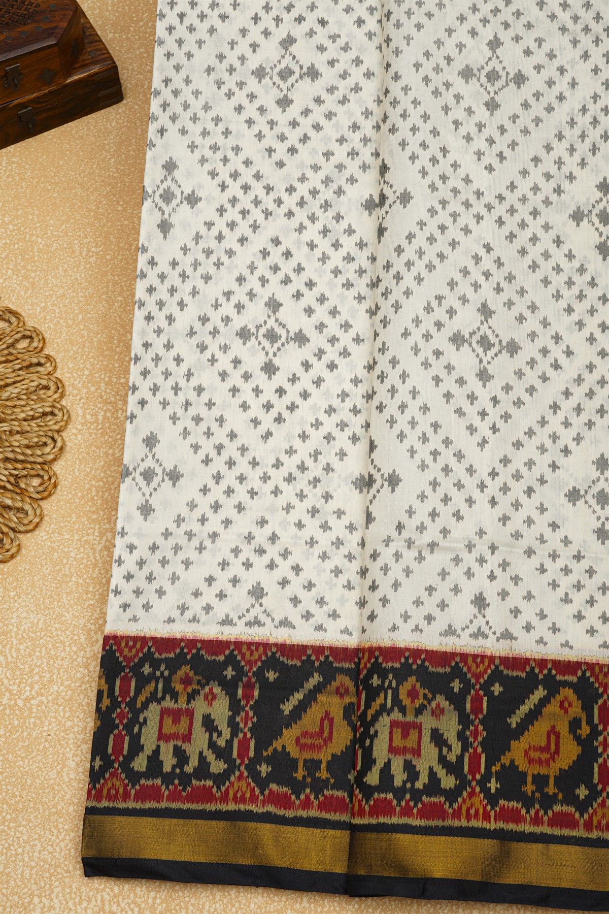 Patola Silk Off White Saree With Grey Geometric Motifs And Traditional Elephant Border