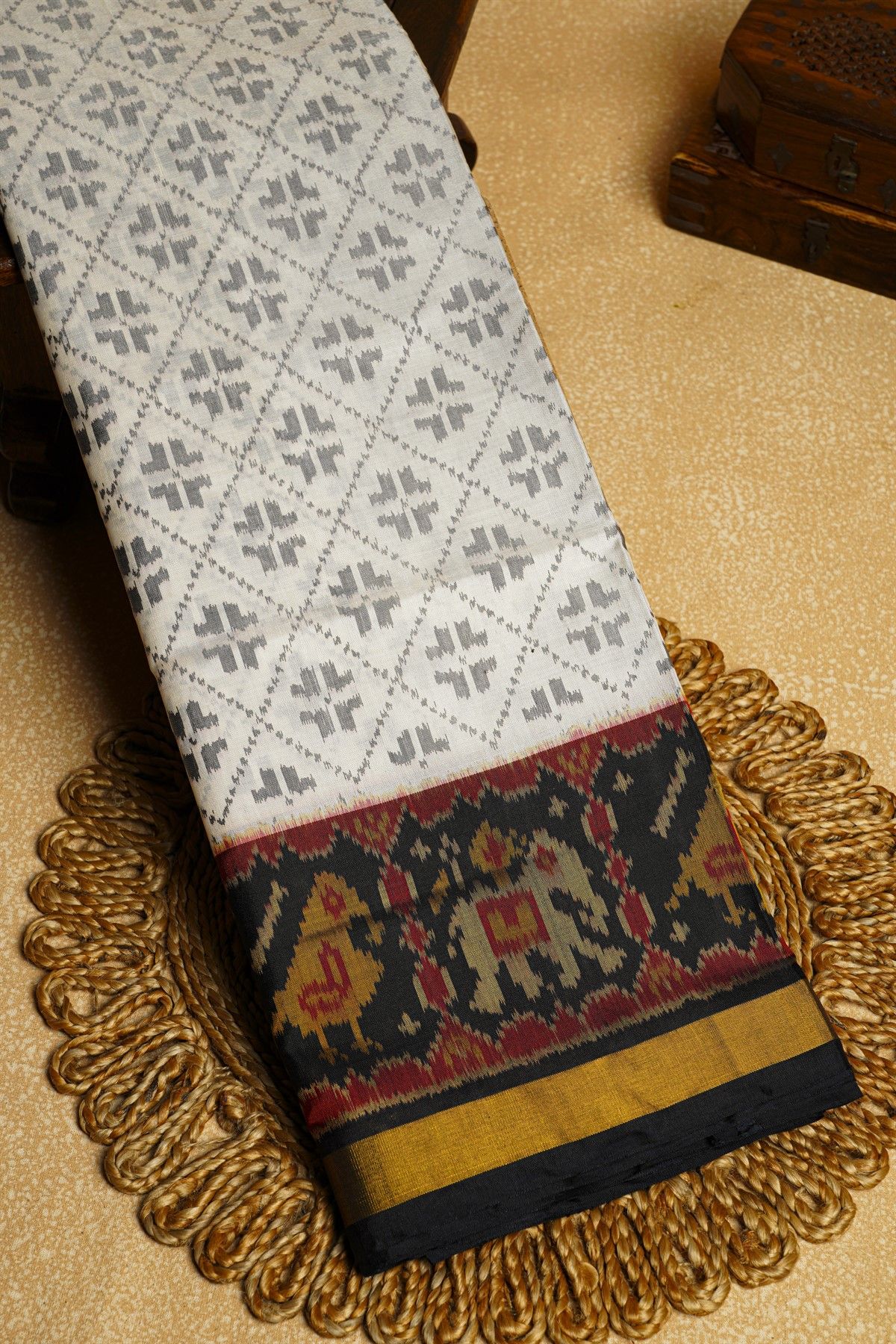 Patola Silk Off White Saree With Buttis In Cross Checks Body