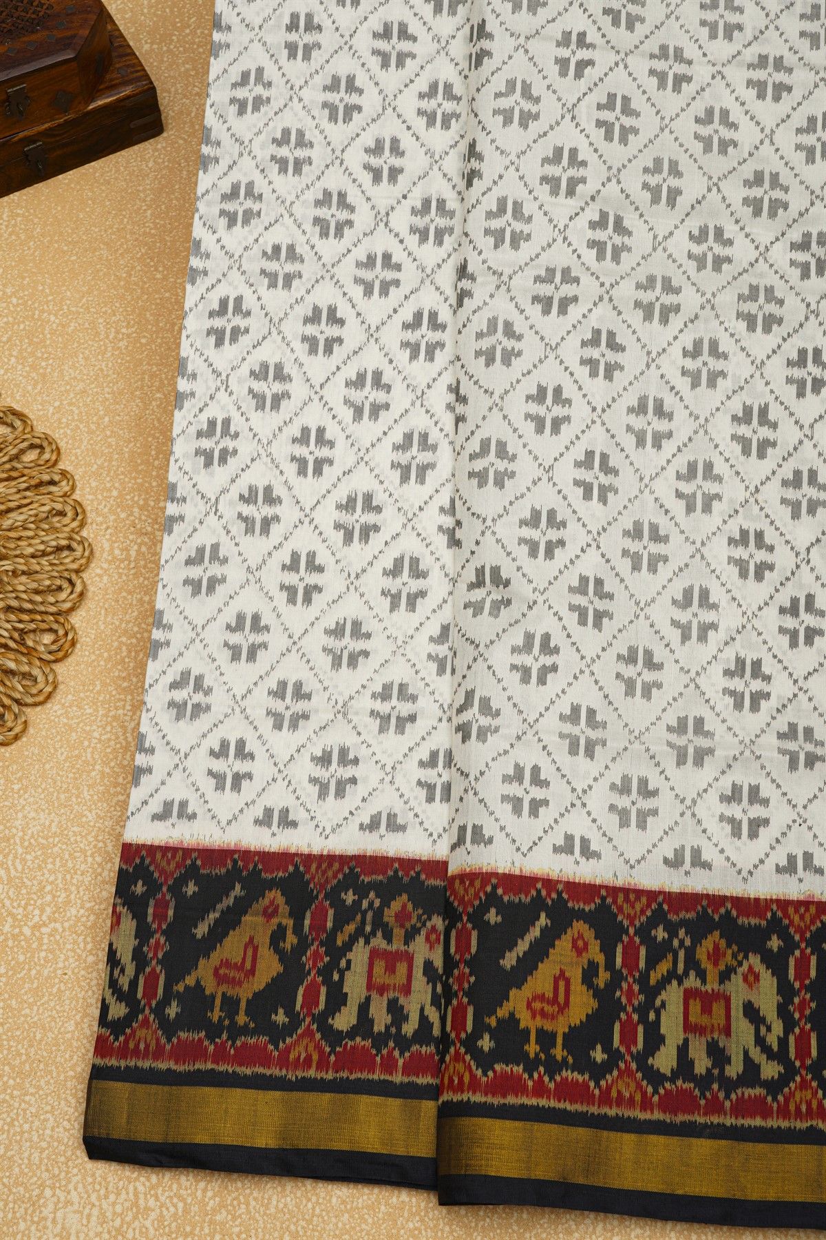 Patola Silk Off White Saree With Buttis In Cross Checks Body