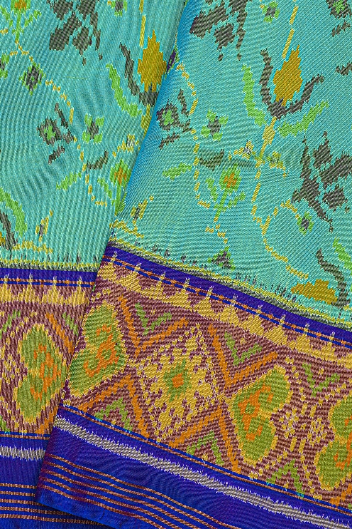 Patola Silk Sea Green Saree With Florals And Leaves Jaal Border