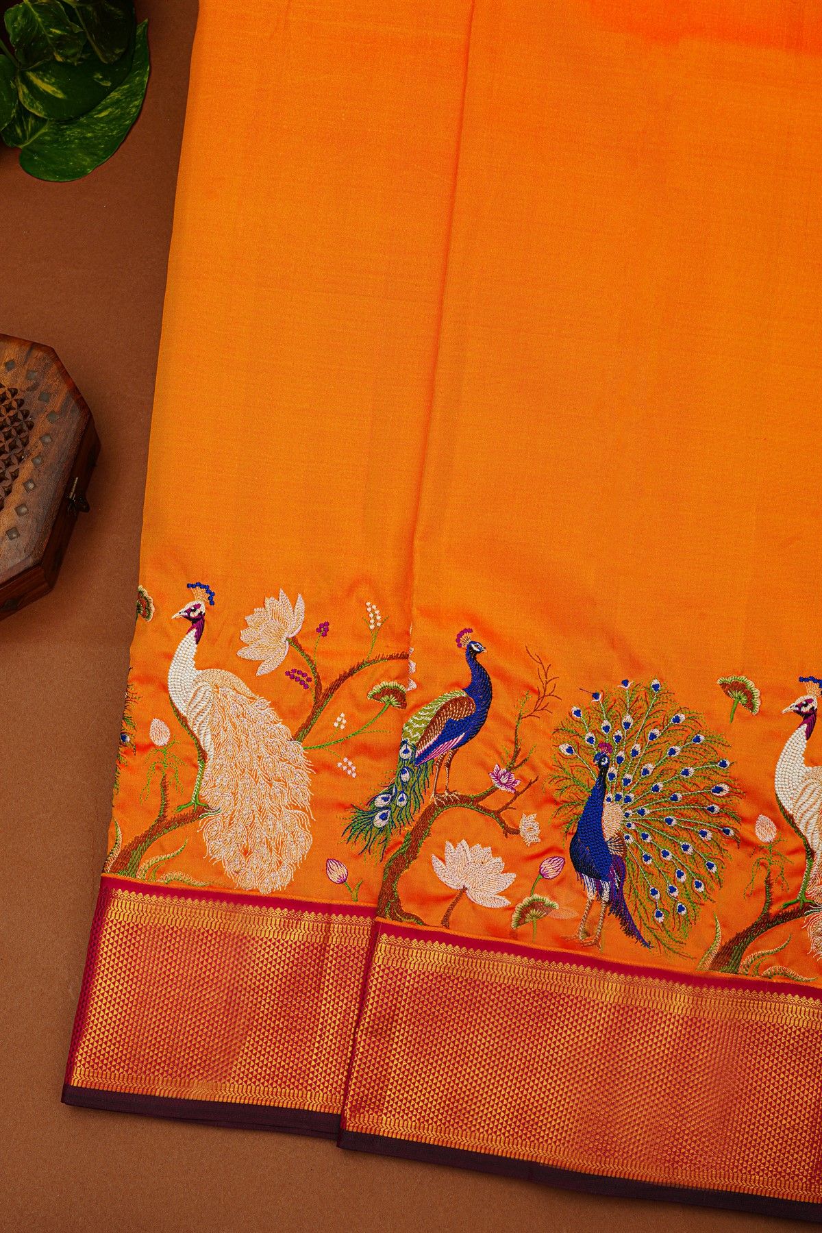 Kancheepuram Silk Orange Saree With Floral And Peacock Thread Work And Zari Border