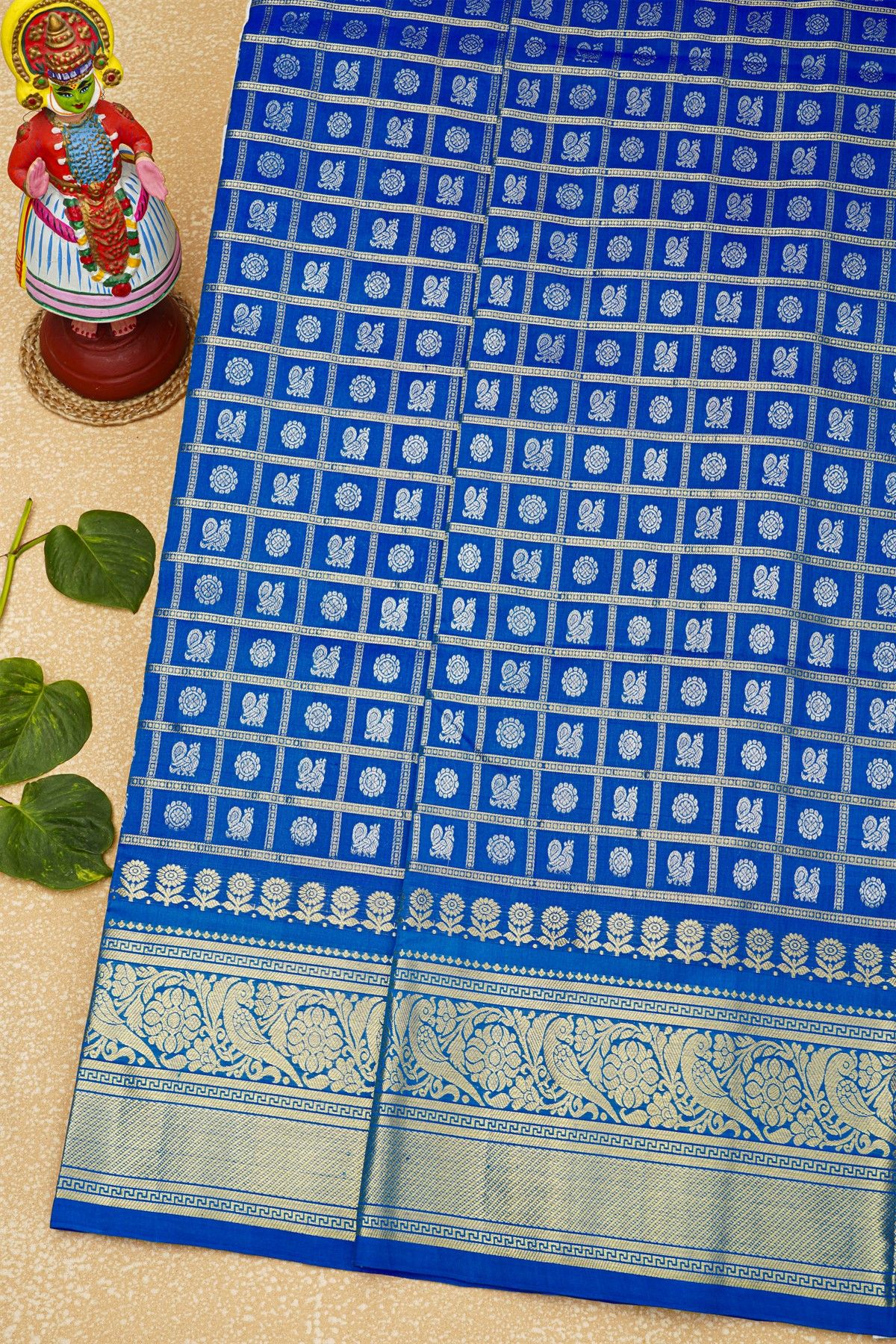 Venkatagiri Silk Royal Blue Saree With Florals And Peacocks In Checks Body