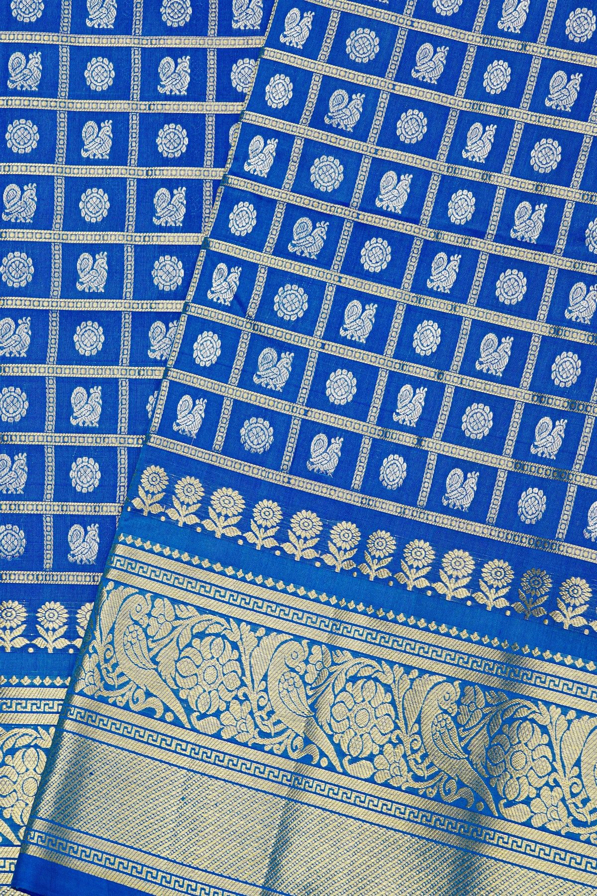 Venkatagiri Silk Royal Blue Saree With Florals And Peacocks In Checks Body