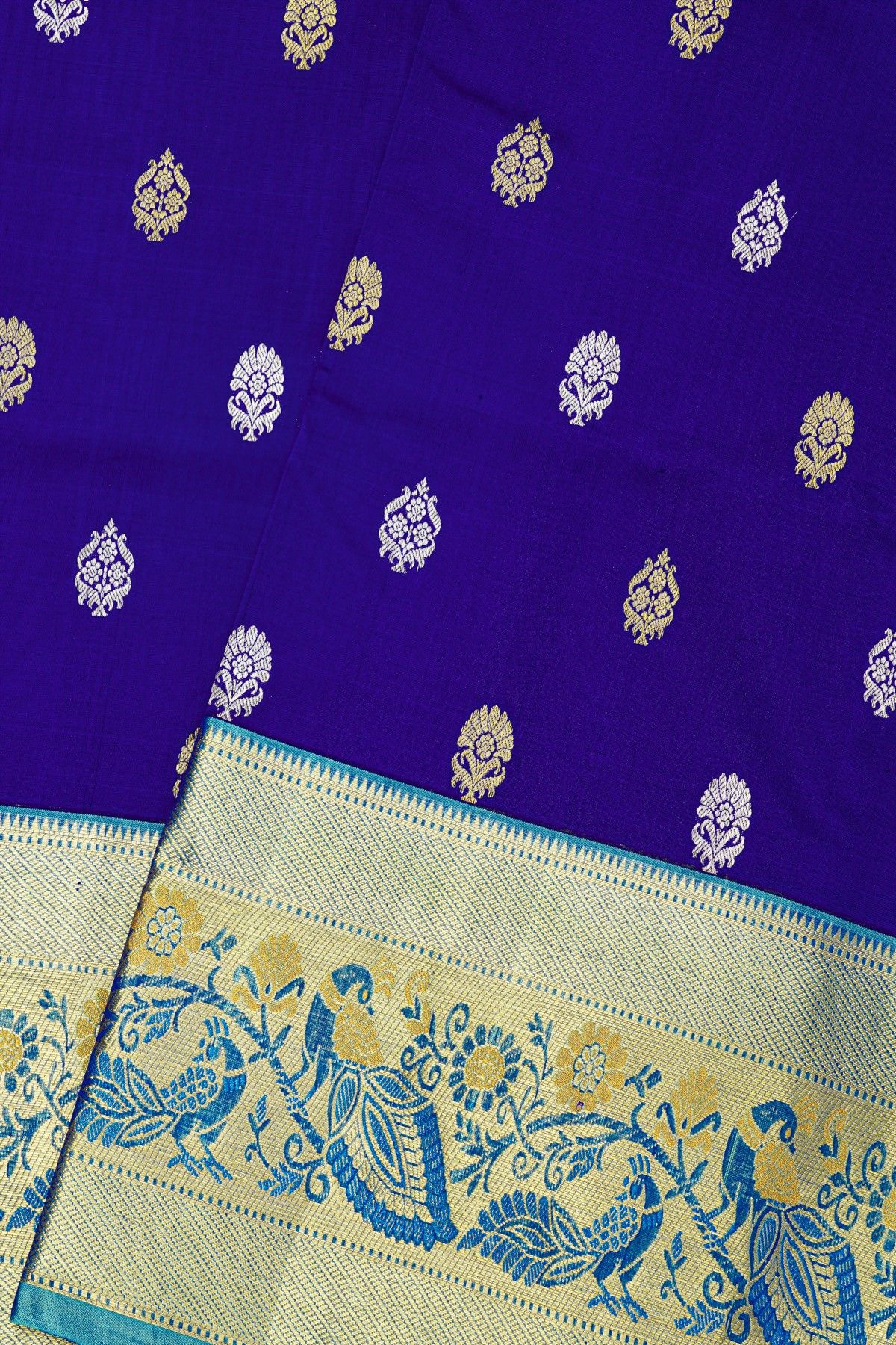 Venkatagiri Silk Royal Blue Saree With Florals And Peacocks Border