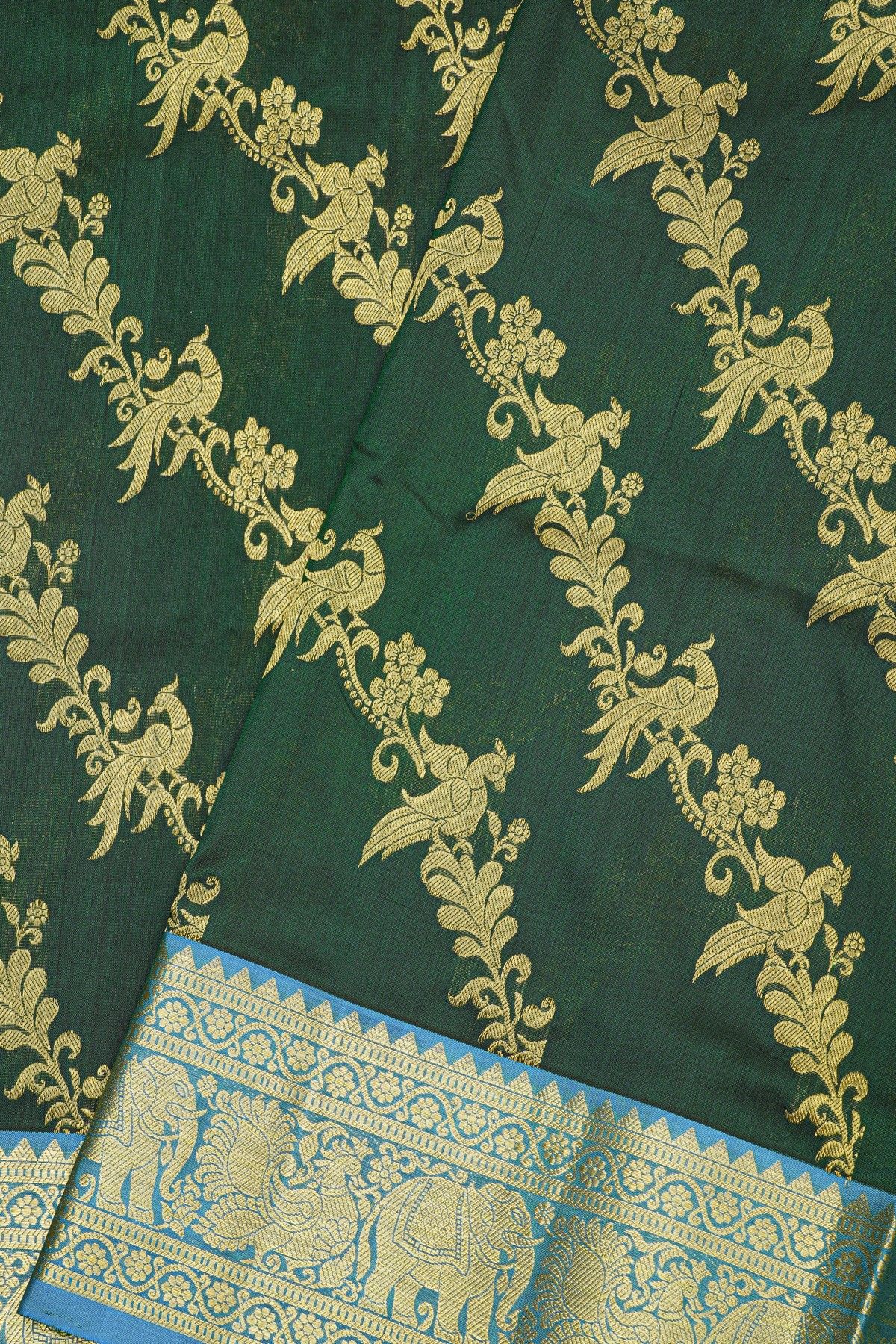 Venkatagiri Silk Bottle Green Saree With Floral Jaal And Peacocks Body
