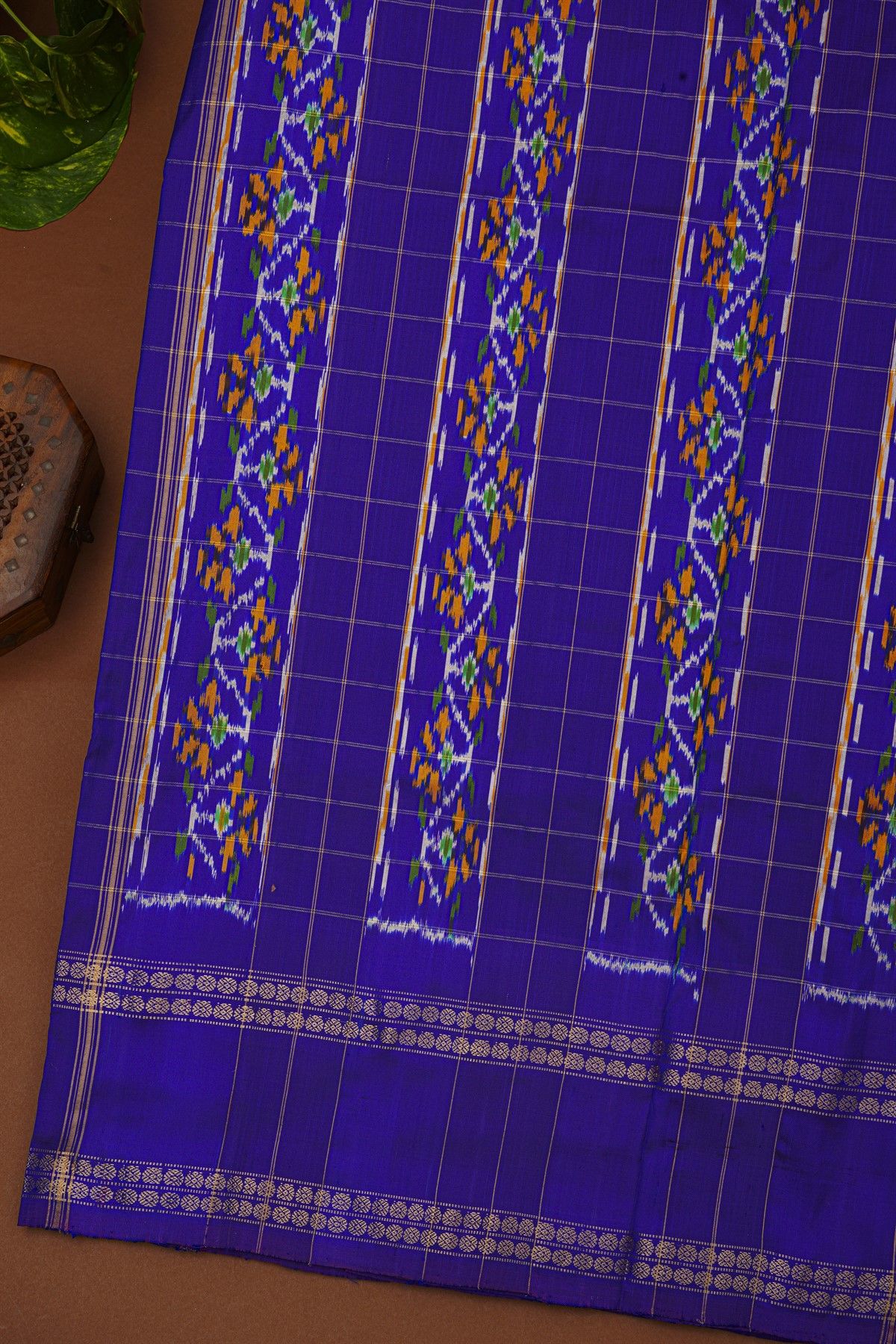 Ikat Silk Rust Saree With Checks And Floral Buttis Body