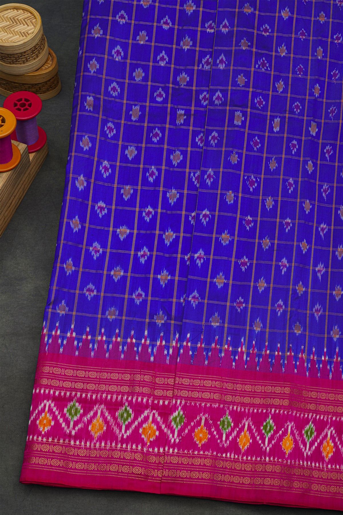 Ikat Silk Royal Blue Saree With Florals And Buttis In Checks Body