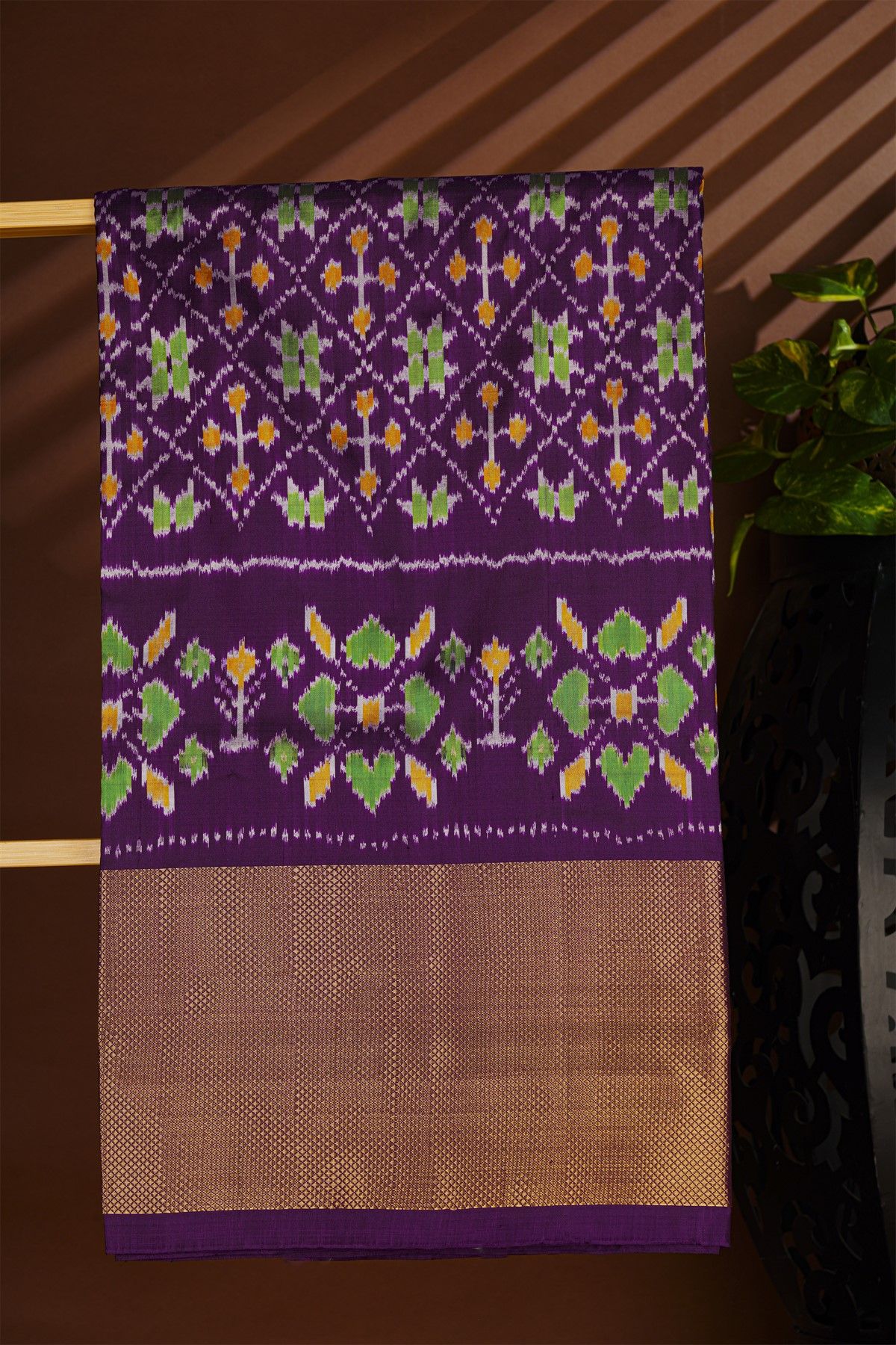 Ikat Silk Navy Blue Saree With Floral And Leaf Pallu