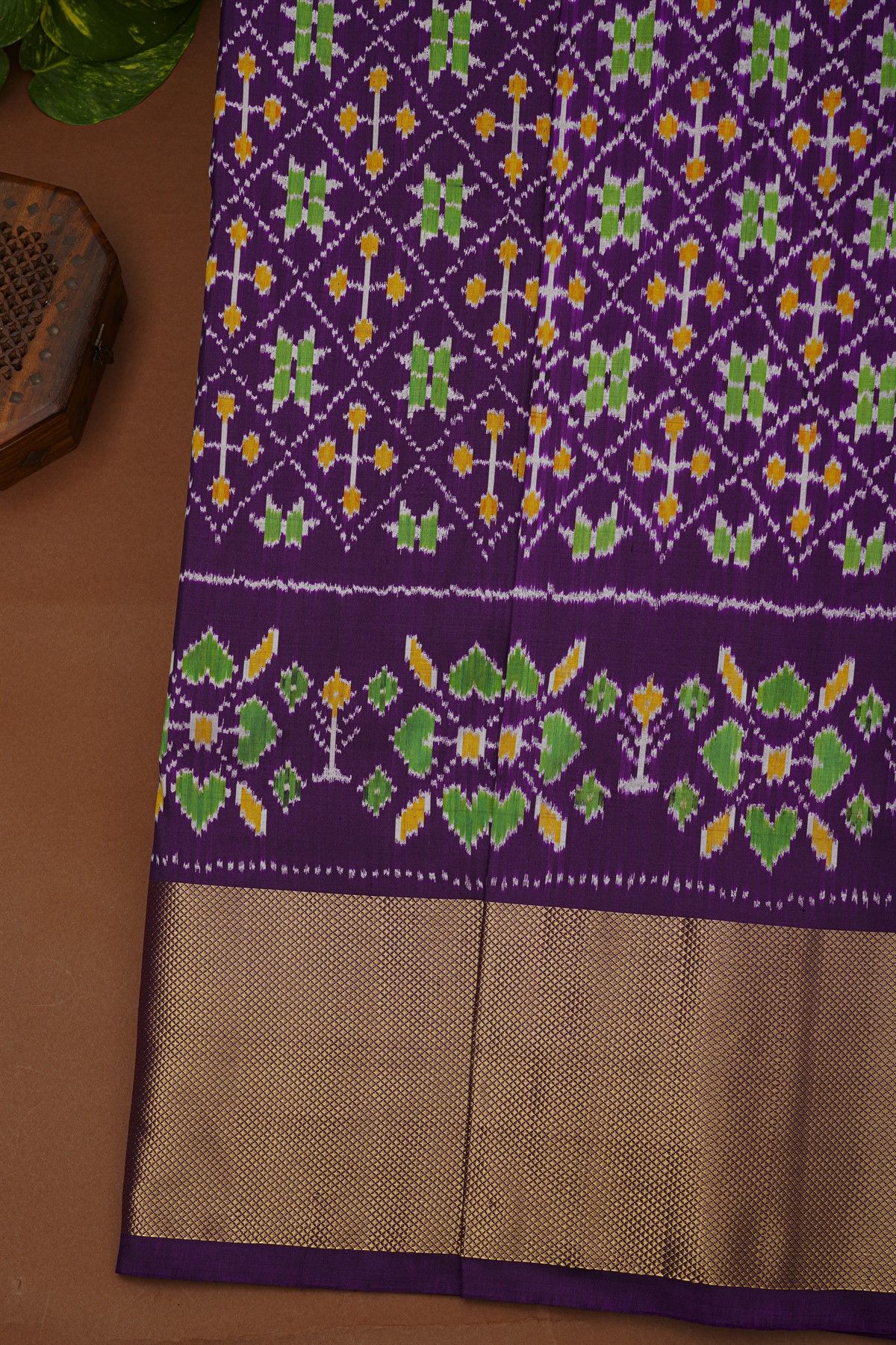 Ikat Silk Navy Blue Saree With Floral And Leaf Pallu
