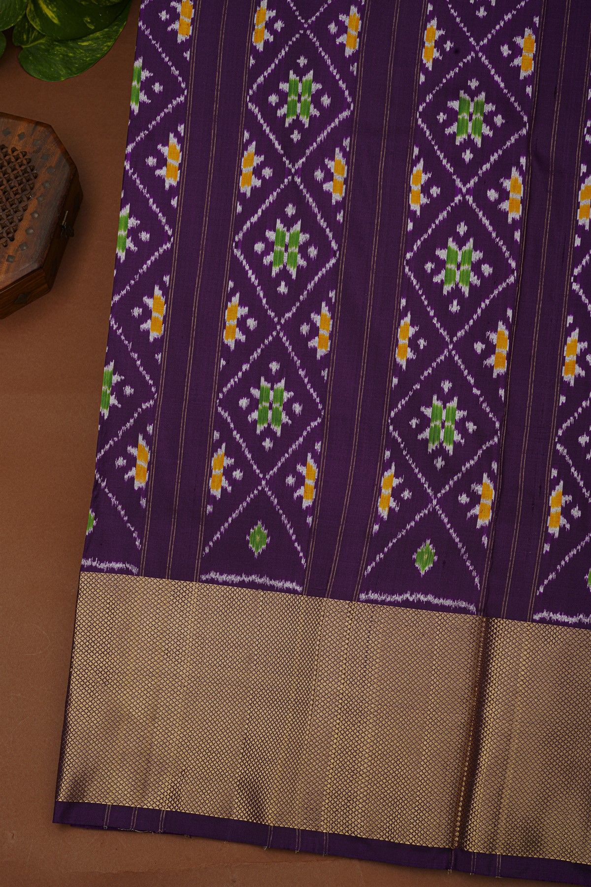 Ikat Silk Navy Blue Saree With Floral And Leaf Pallu