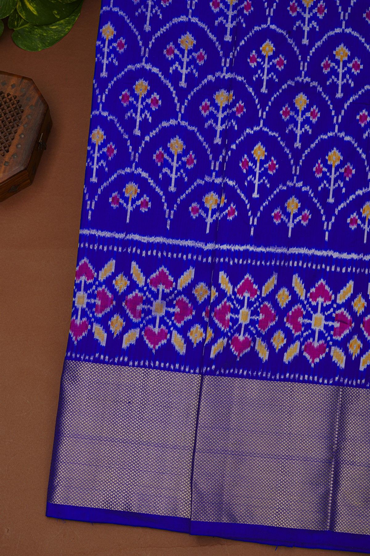 Ikat Silk Royal Blue Saree With Florals And Leaves Body