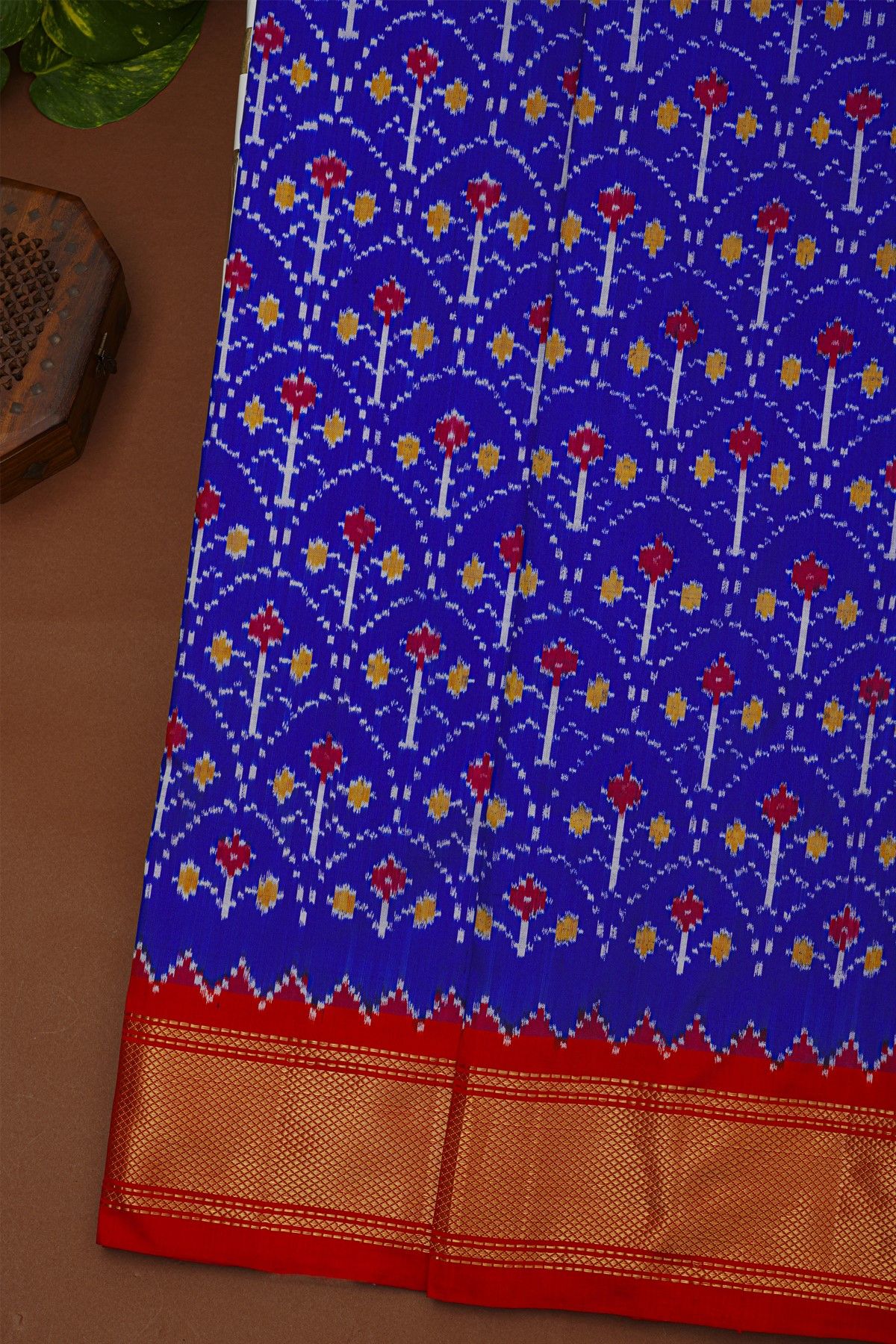 Ikat Silk Royal Blue Saree With Florals And Leaves Body