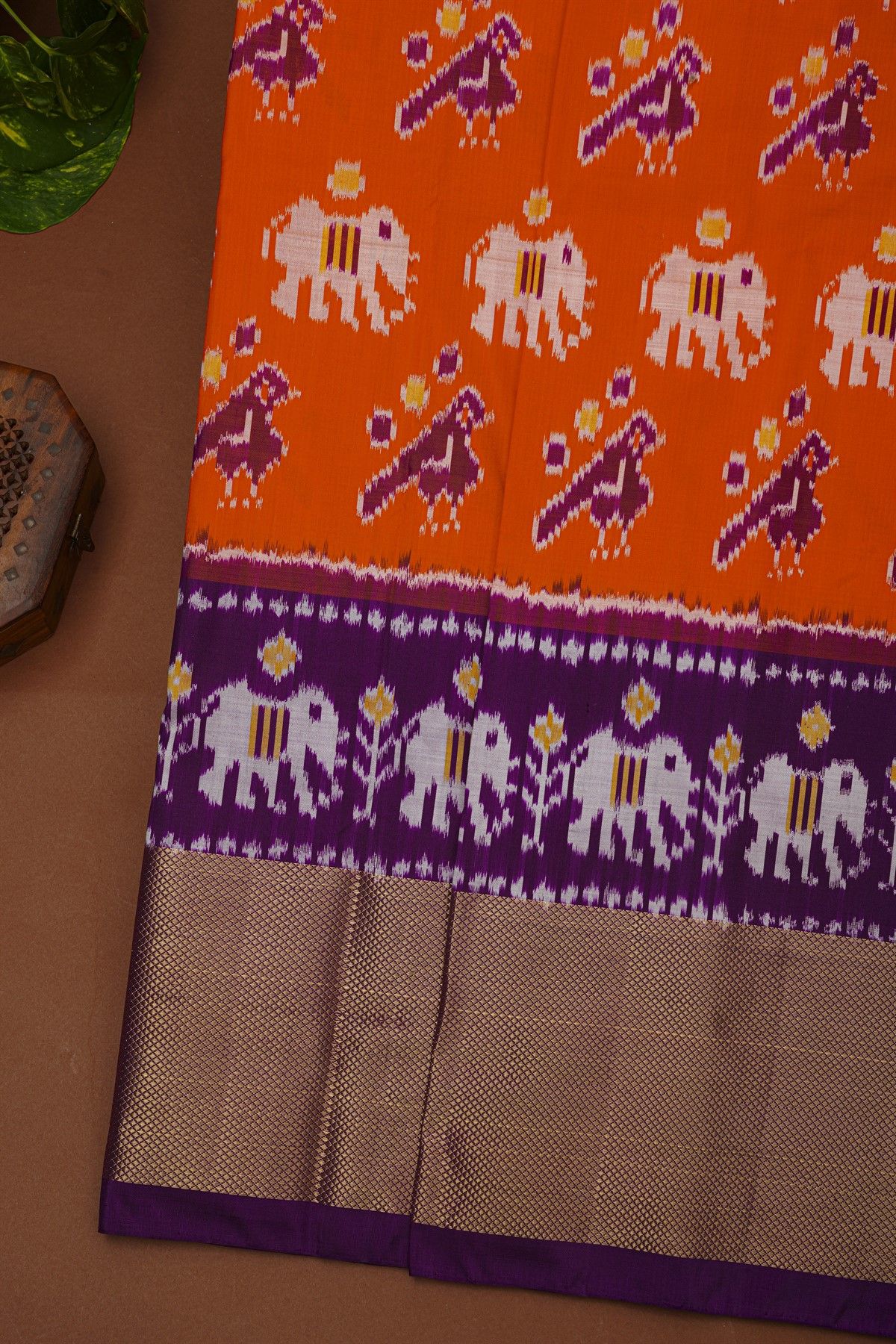 Ikat Silk Orange Saree With Parrots And Elephant Buttis Body