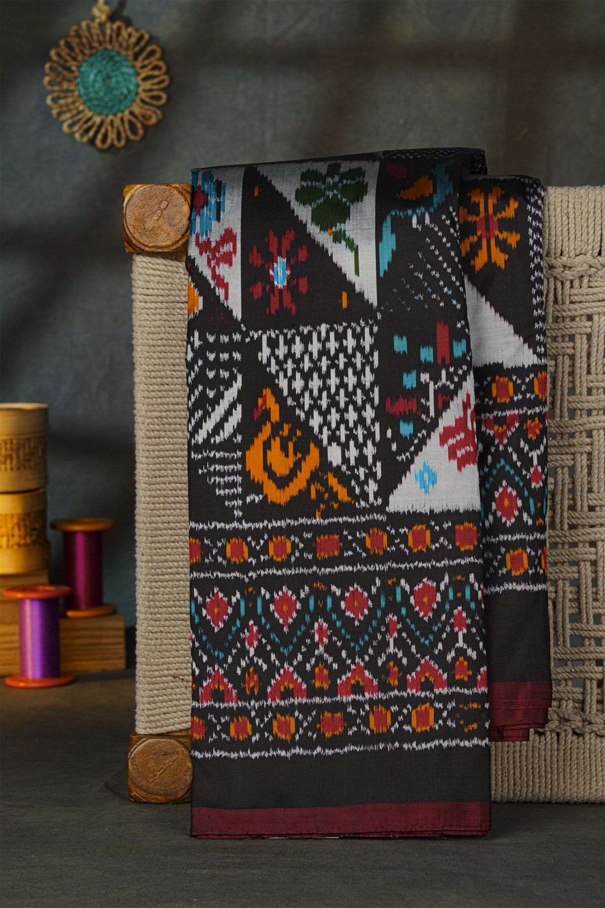 Ikat Silk Black Saree With Florals And Buttis Body