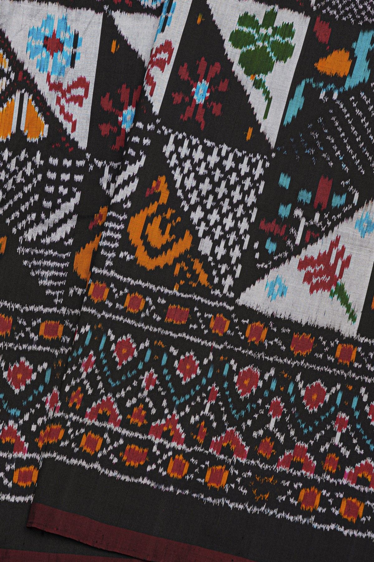 Ikat Silk Black Saree With Florals And Buttis Body