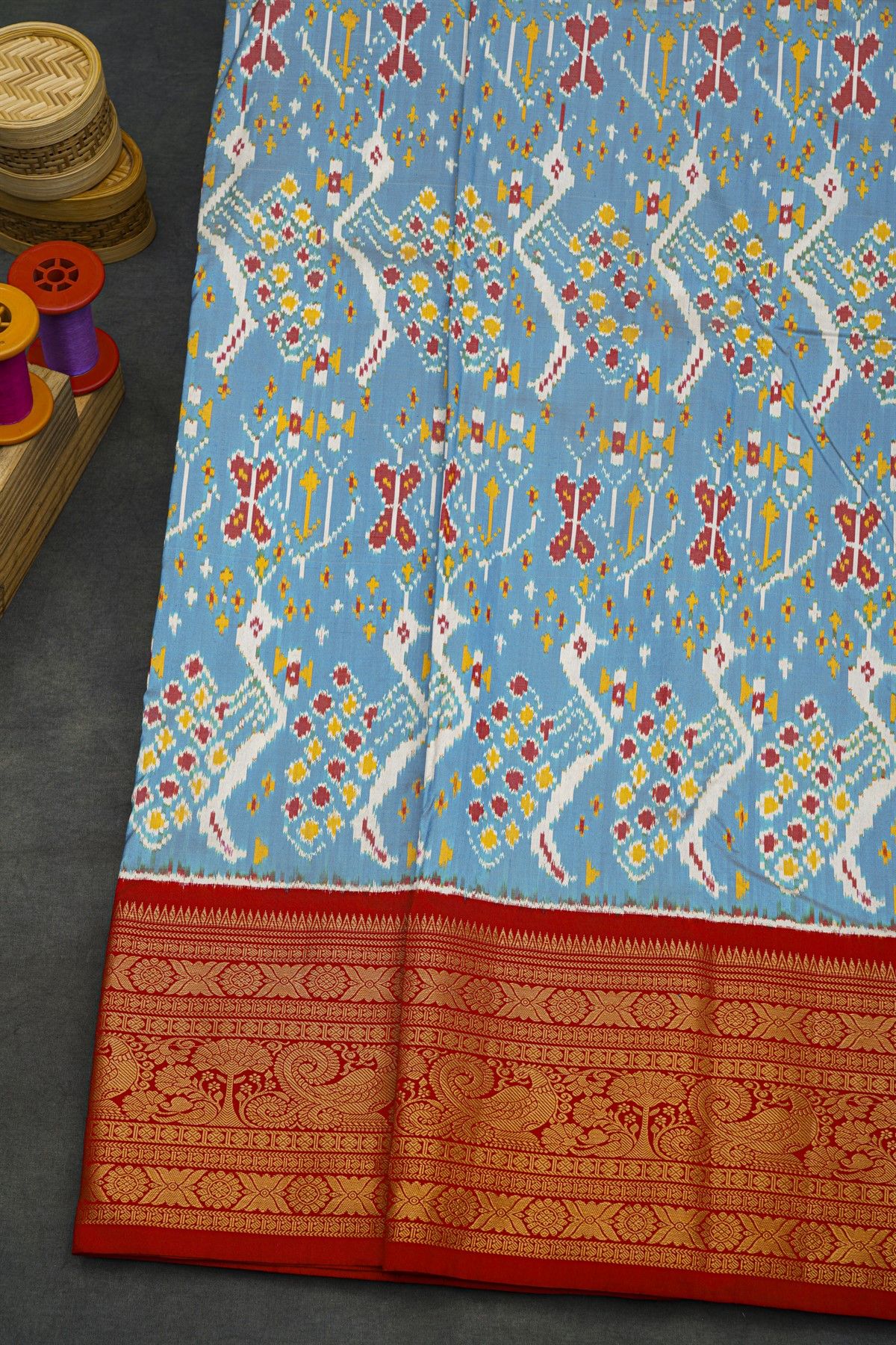 Pochampally Ikat Silk Sky Blue Saree With Floral And Peacock Border