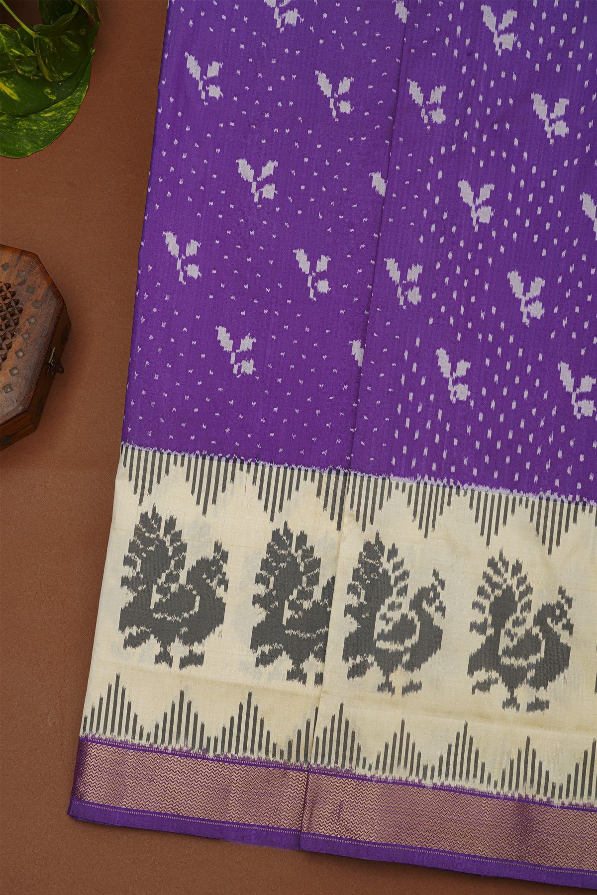 Ikat Silk Purple Saree With Peacocks And Zig-Zag Lines Border