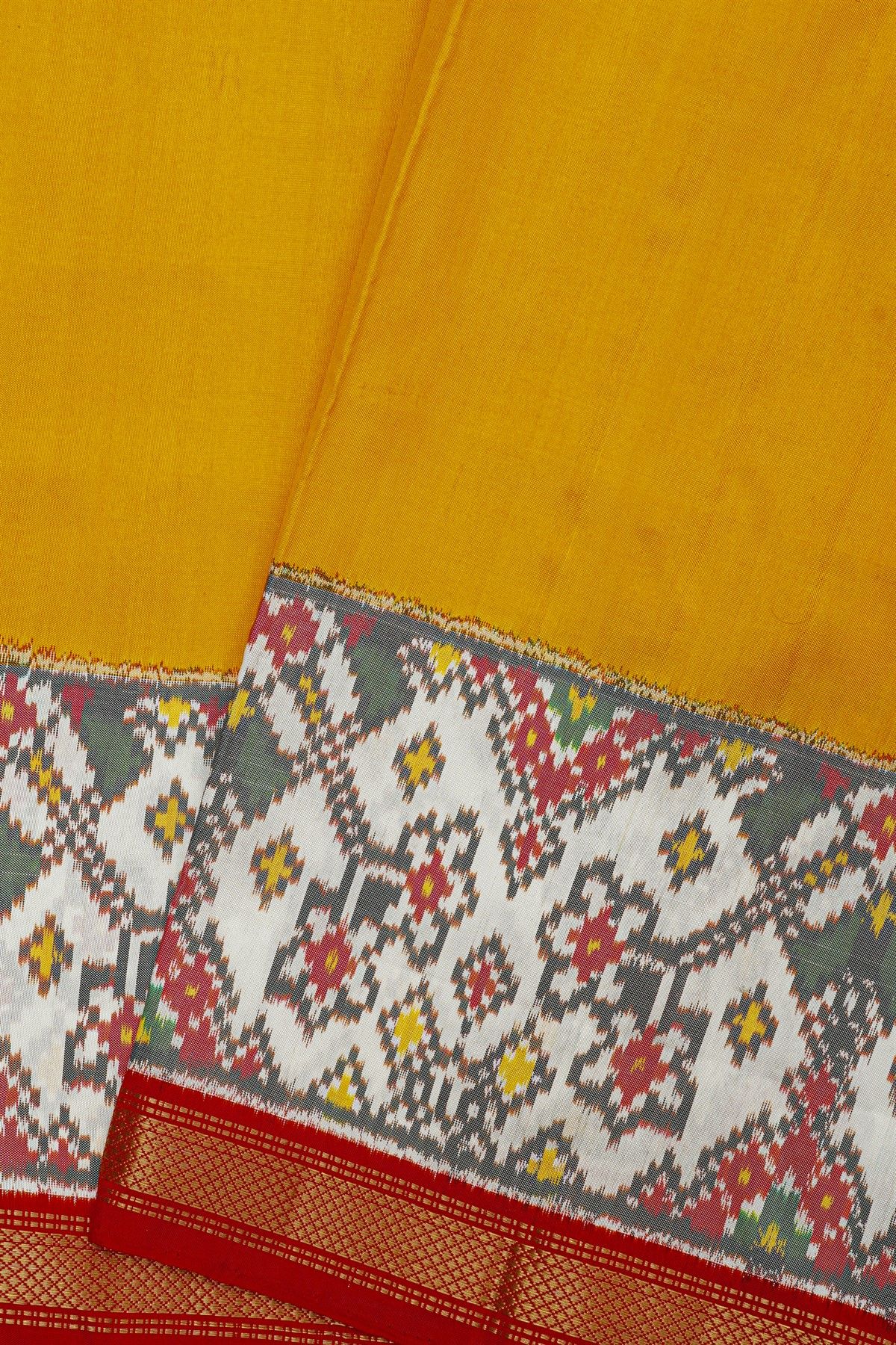 Ikat Silk Yellow Saree With Florals And Leaves With Diamonds Border