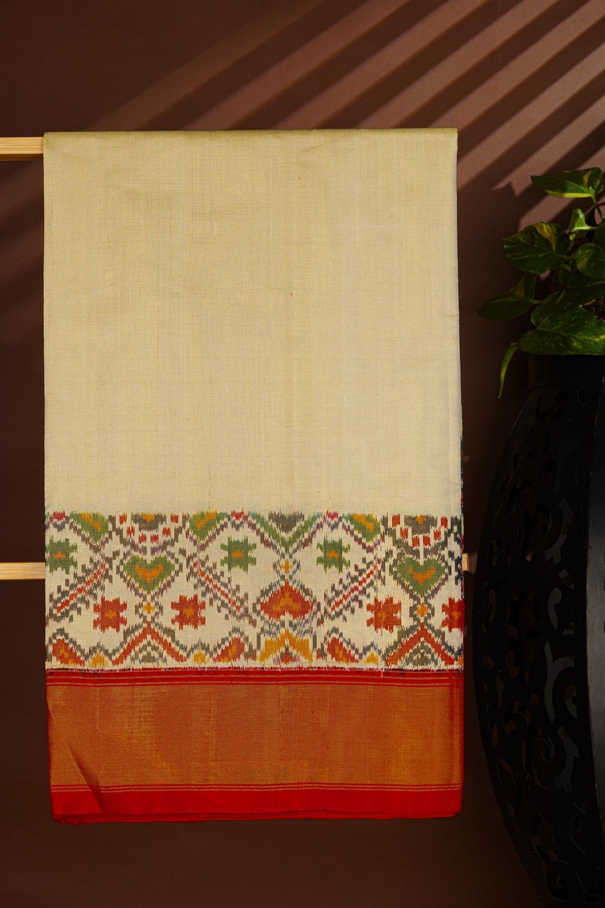 Ikat Silk Cream Saree With Florals And Kaddi Border