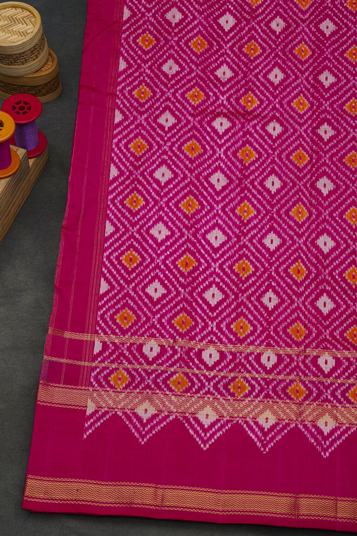 Pochampally Ikat Silk Rani Pink Saree With Floral And Leaf Jaal Border