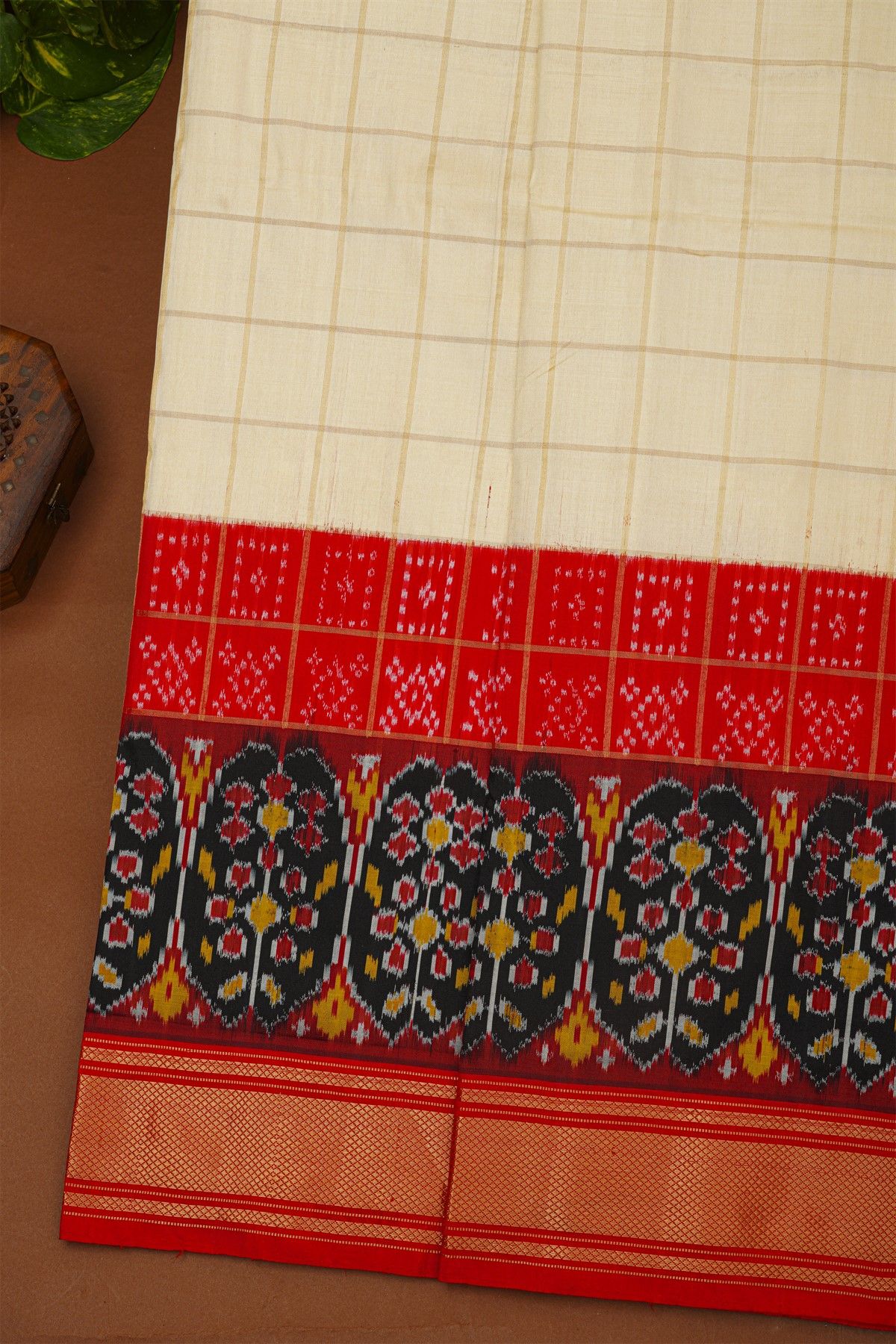 Ikat Silk Cream Saree With Florals And Diamonds In Checks Border