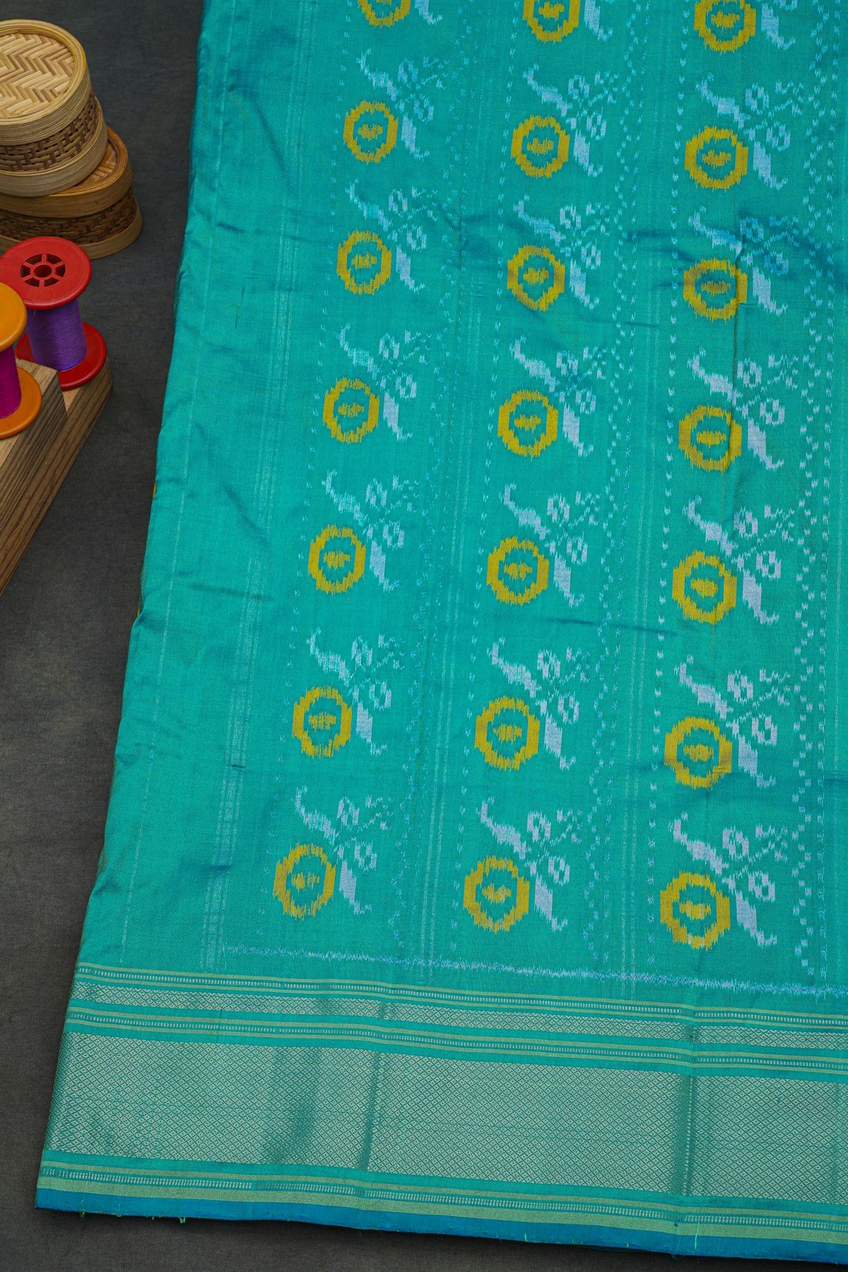 Pochampally Ikat Silk Mehendi Green Saree With Floral Body And Ikat Butti Pallu