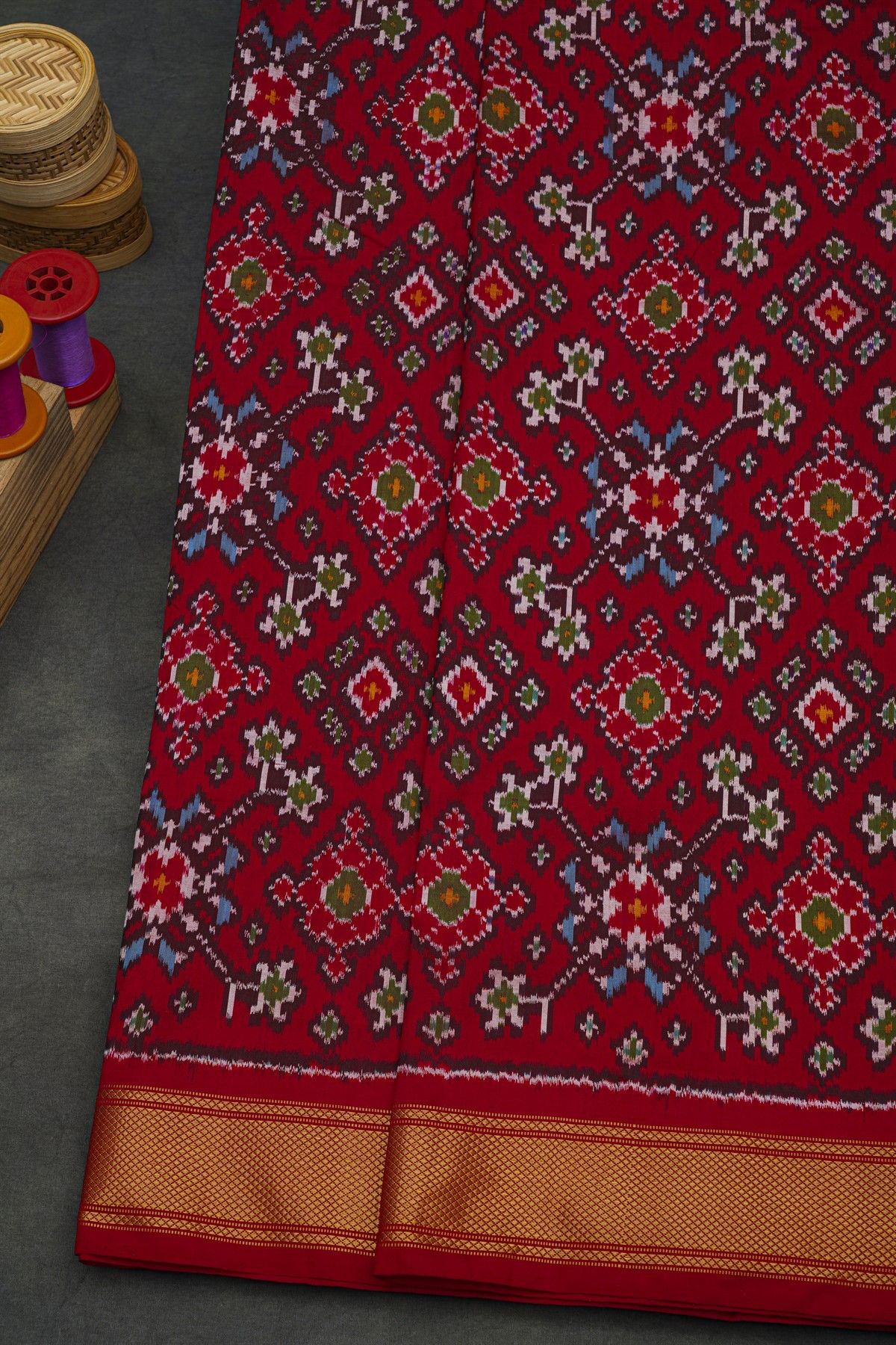 Ikat Silk Maroon Saree With Florals And Leaves Body