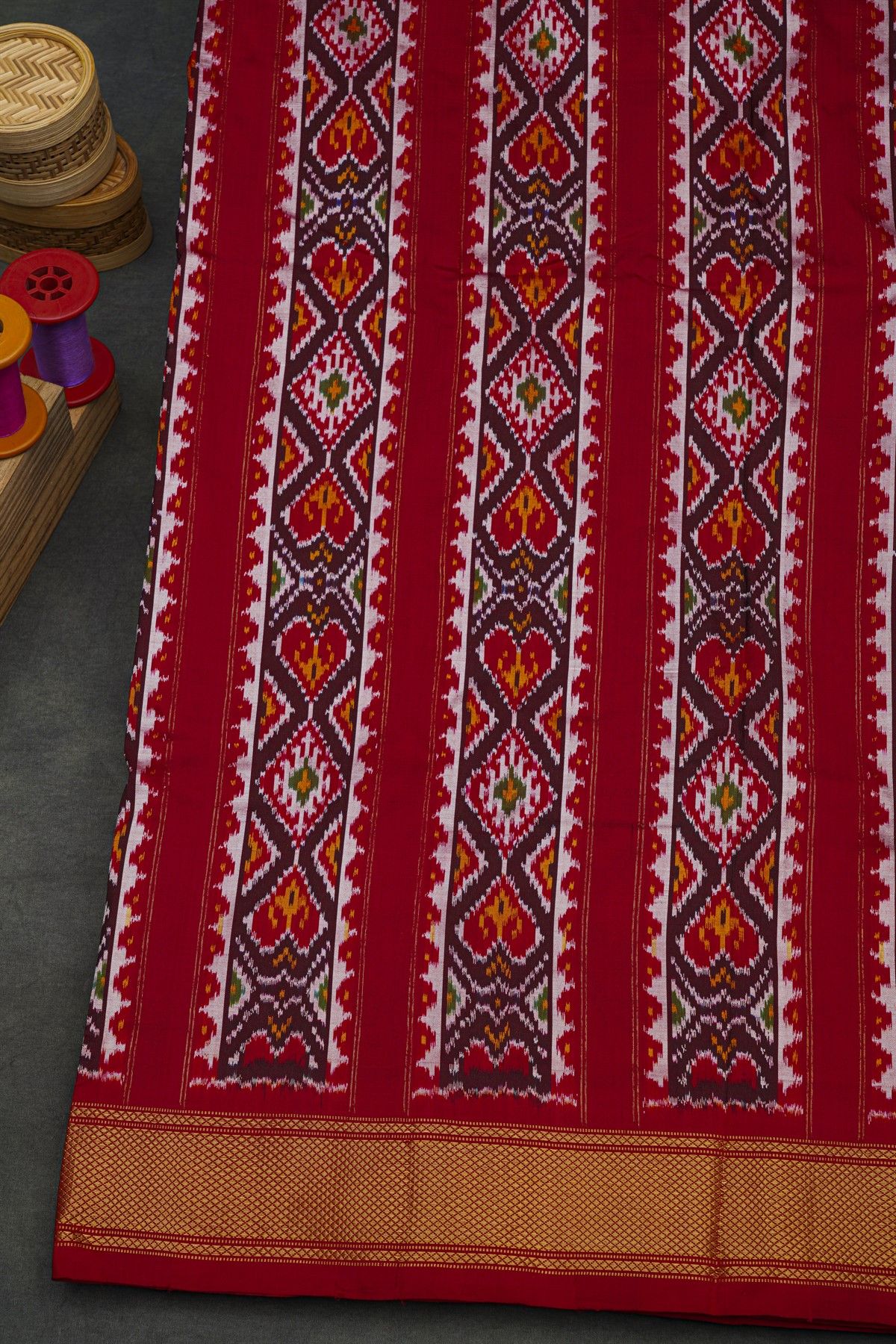 Ikat Silk Maroon Saree With Florals And Leaves Body