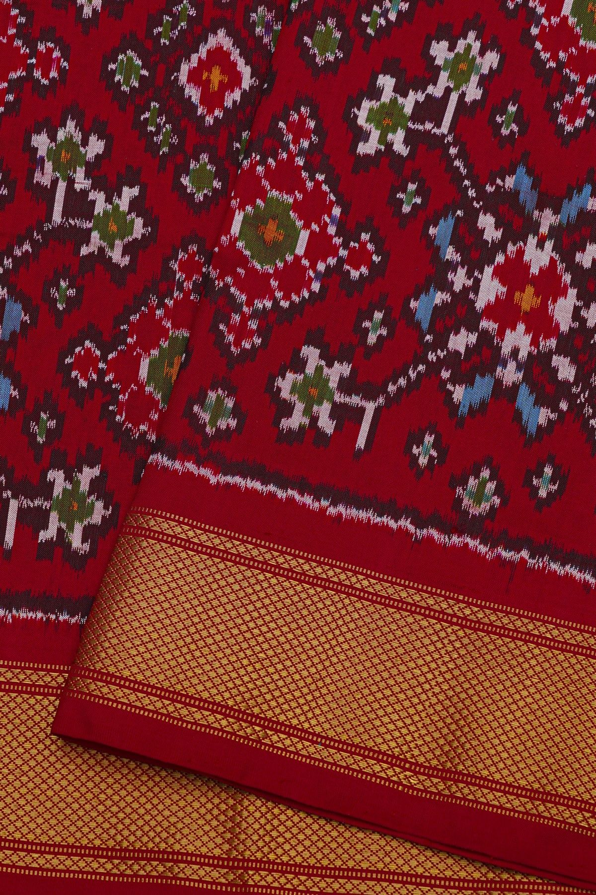 Ikat Silk Maroon Saree With Florals And Leaves Body